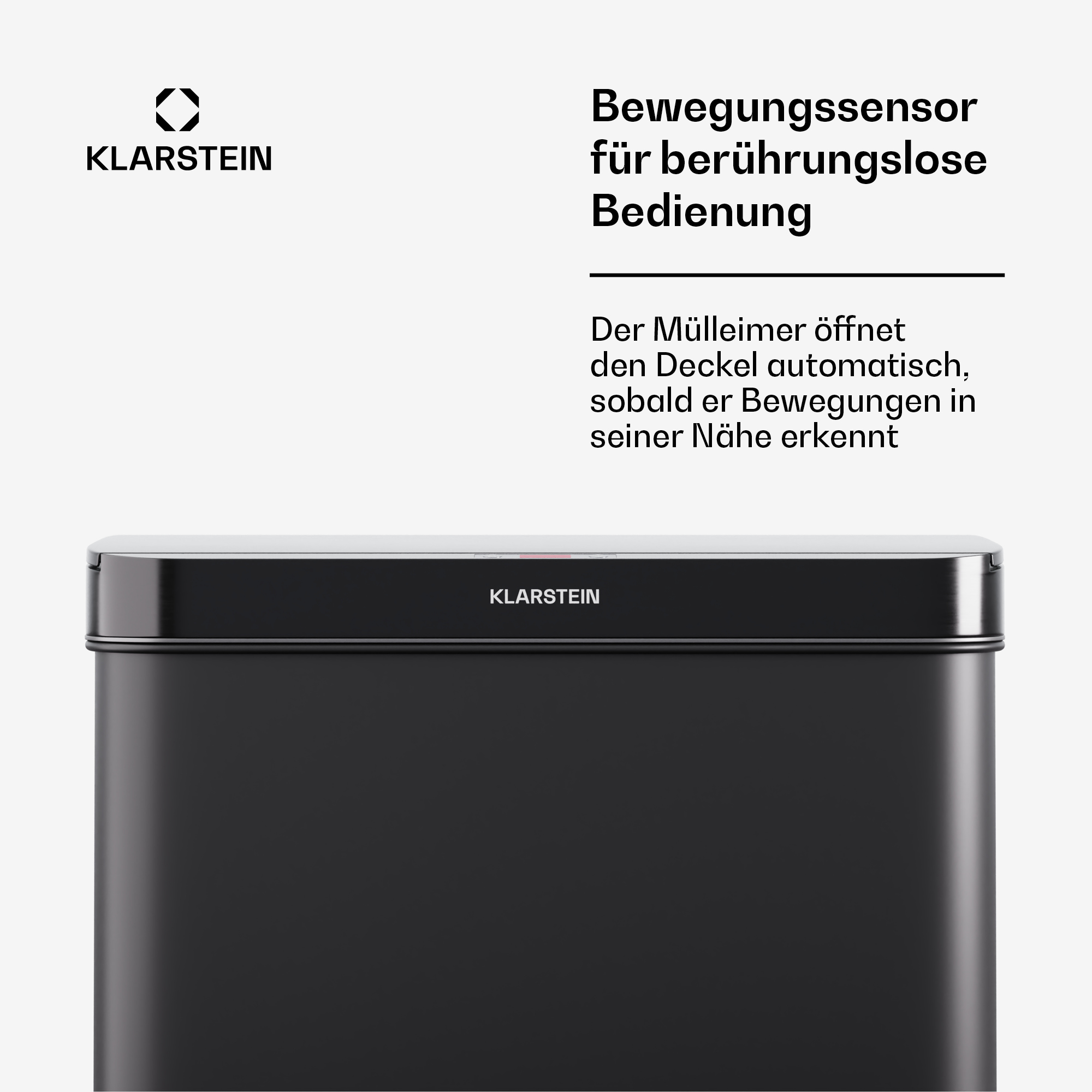 Schwarze rechteckige Mülltonne mit geschlossenem Deckel. Text über berührungslose Bedienung.