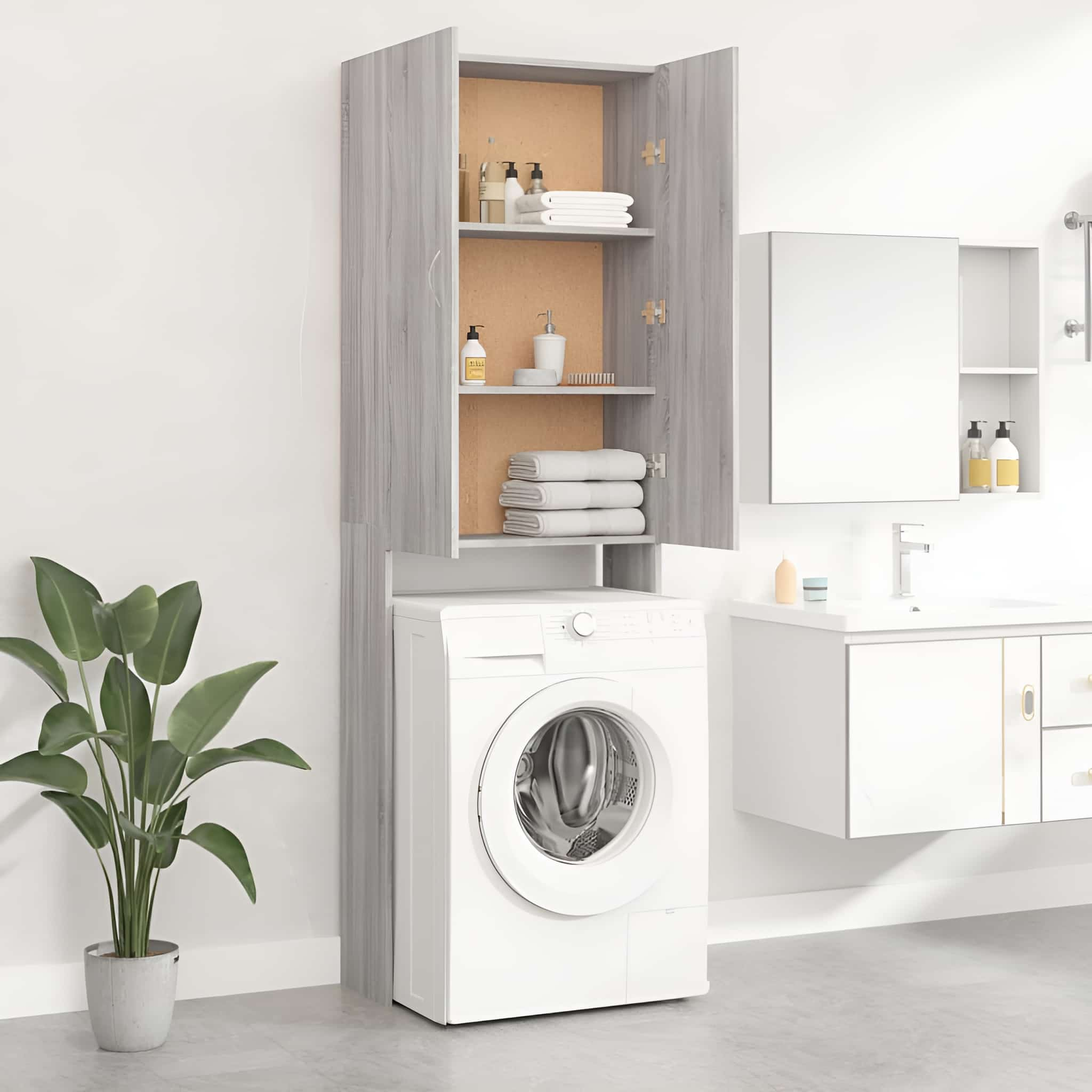 Badezimmer mit Schrank, Waschbecken und Waschmaschine. Die Schranktüren sind offen.