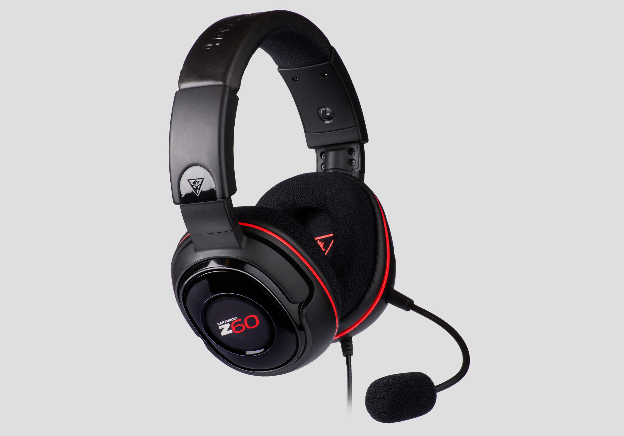 Cuffie Turtle Beach nere con dettagli rossi e microfono su sfondo grigio chiaro.