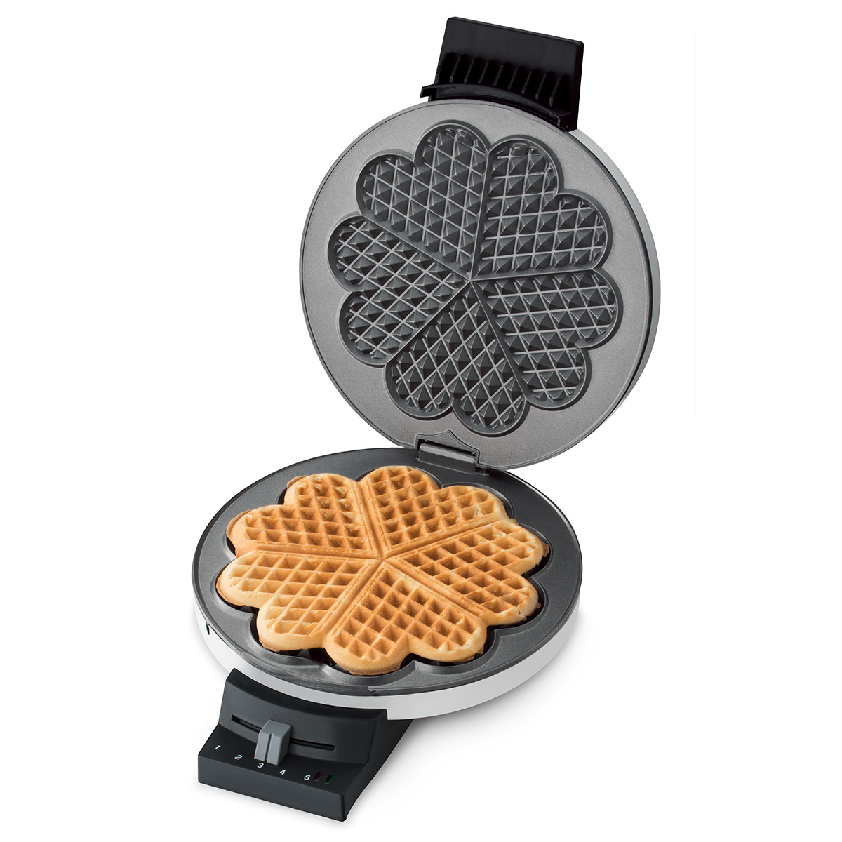 Otwarta gofrownica, pokazująca upieczone gofry w kształcie serca.