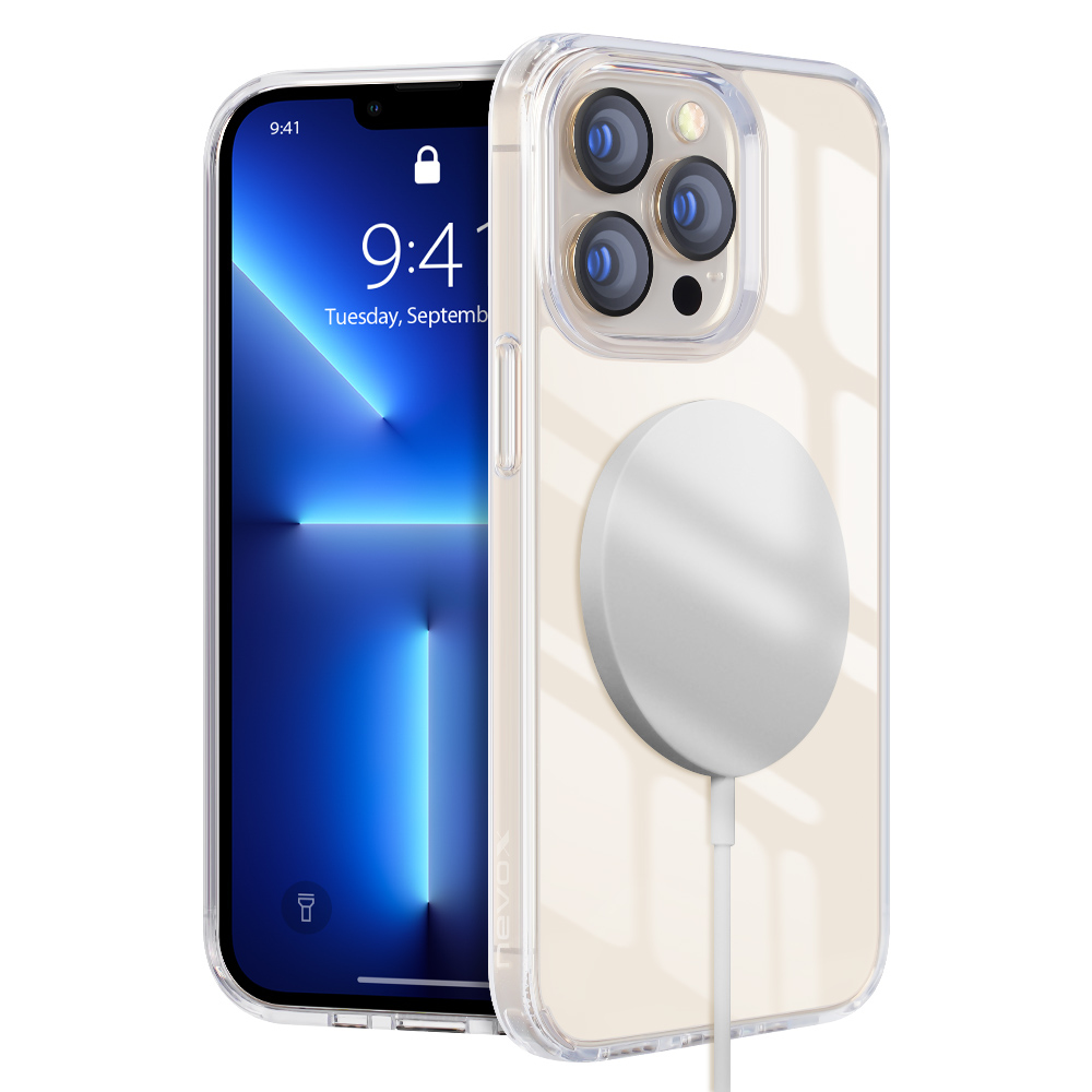 Un telefono in una custodia trasparente con un caricatore circolare bianco collegato.