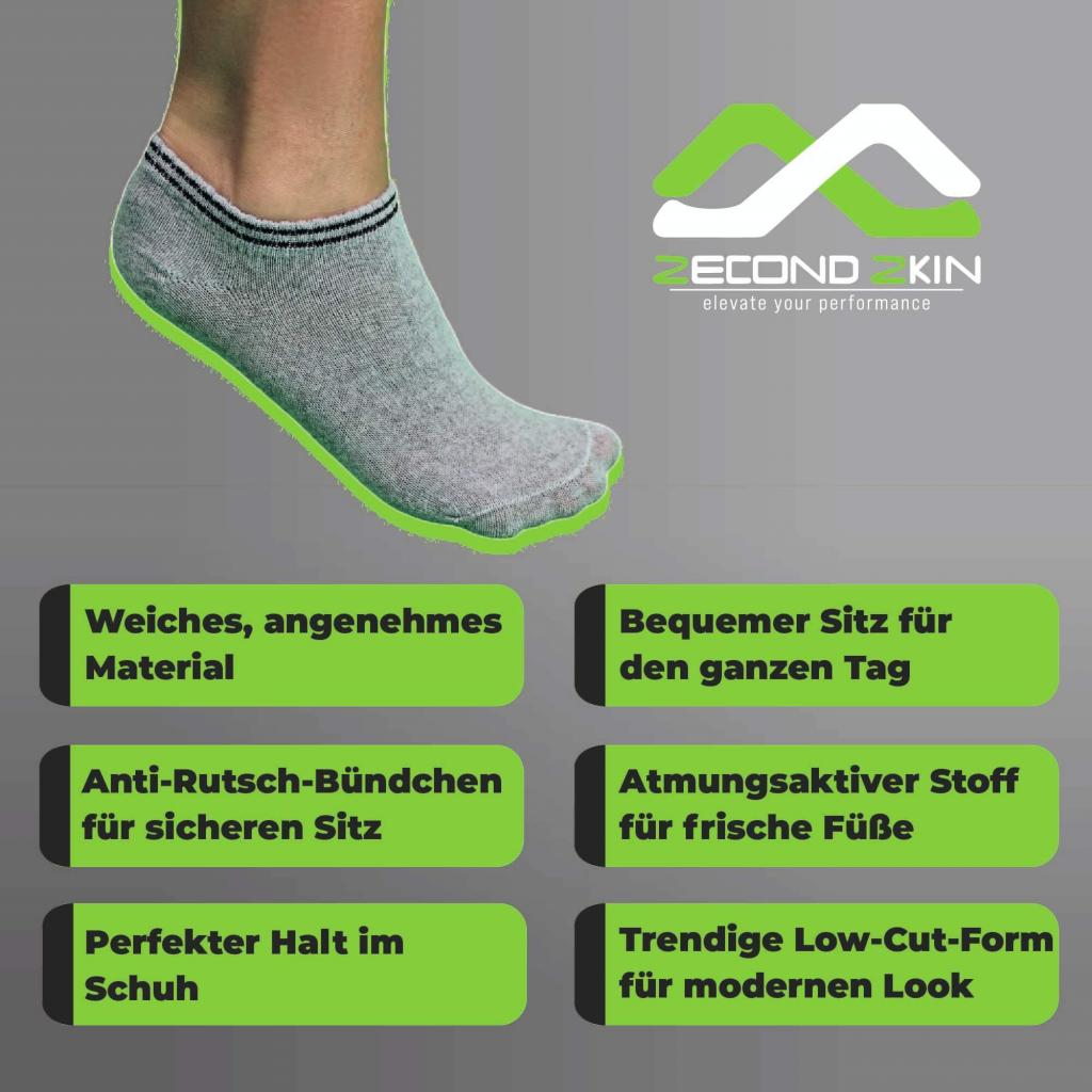 Graue Socken mit grünen und schwarzen Details.