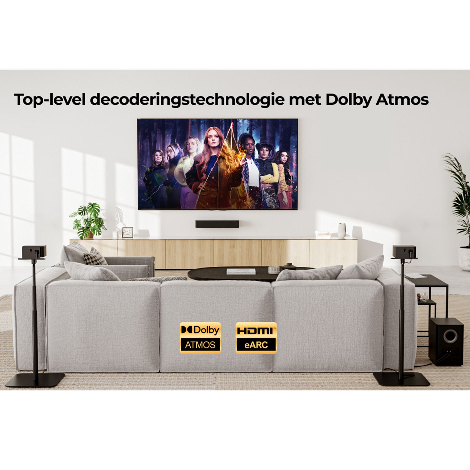 Living room with a TV, sofa, and speakers. Text on the top says 'Top-level decoding... Dolby Atmos'