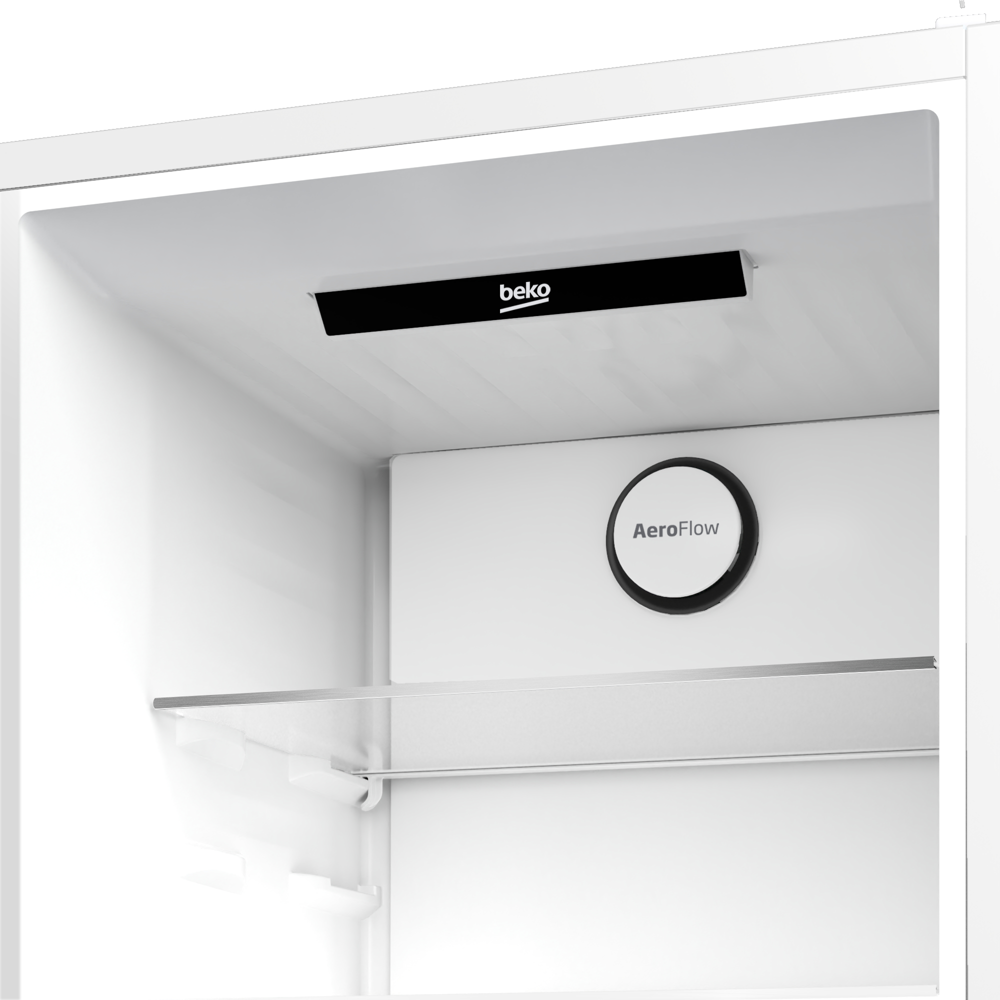 Vista interna di un frigorifero bianco con ripiani e un componente nero a marchio beko.