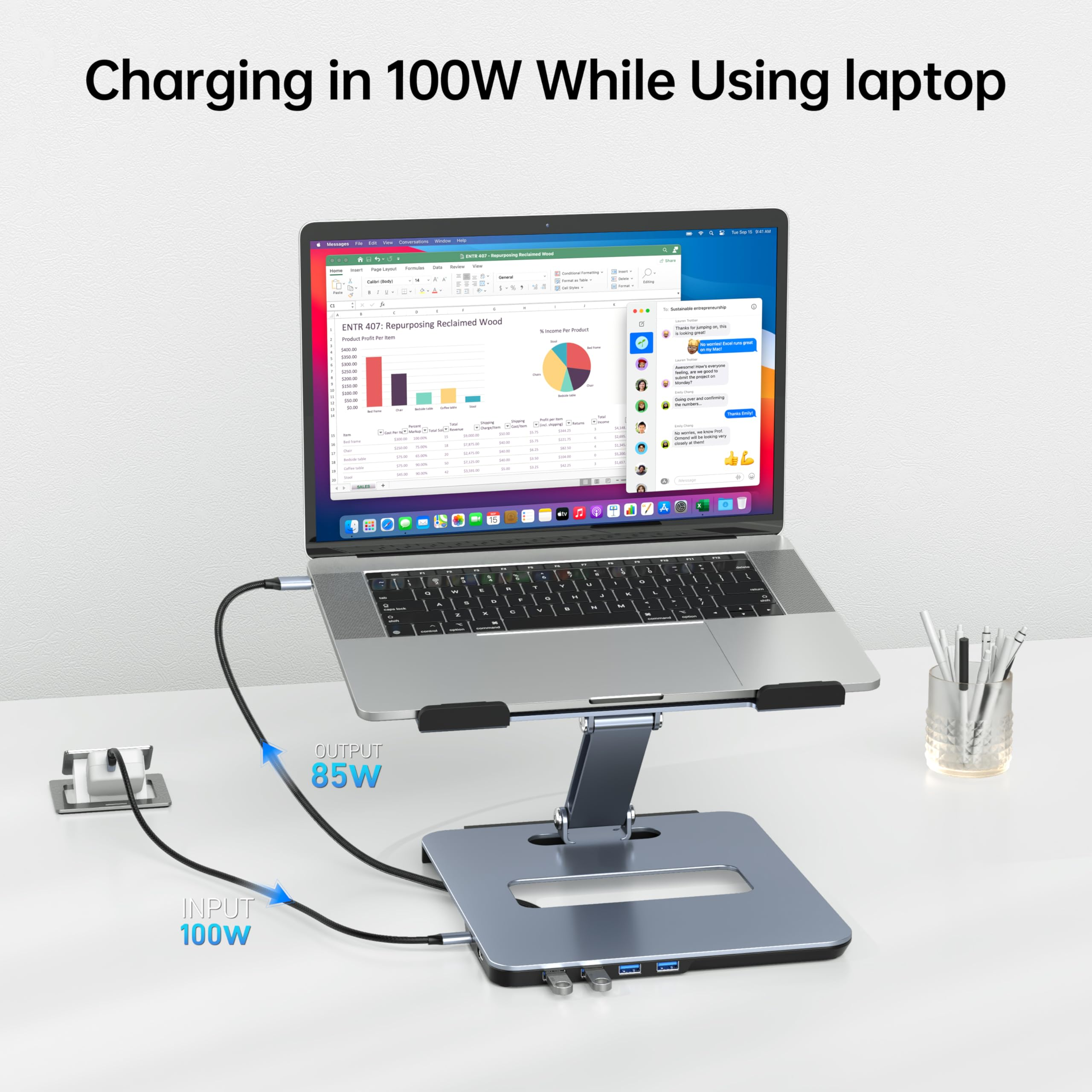 Laptop auf Ständer mit Ein-/Ausgängen. Eingang ist 100W, Ausgang ist 85W.