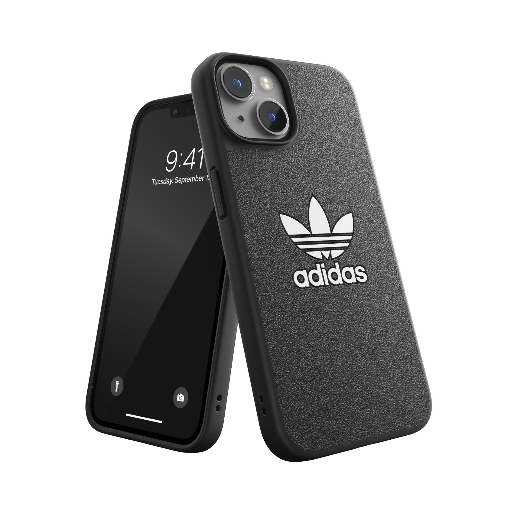 Due telefoni con custodie Adidas nere. Uno mostra l'ora e la data.