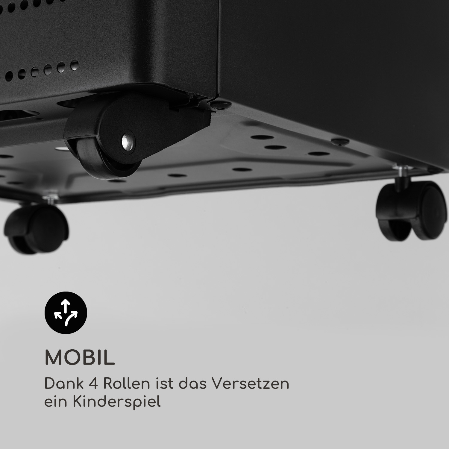 Die Basis eines schwarzen Geräts mit vier kleinen Rollen. Der Text sagt: MOBIL, einfach zu bewegen.