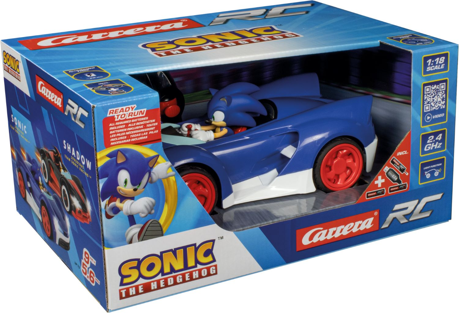 Voiture jouet Sonic the Hedgehog dans une boîte. La voiture est bleue avec des roues rouges.