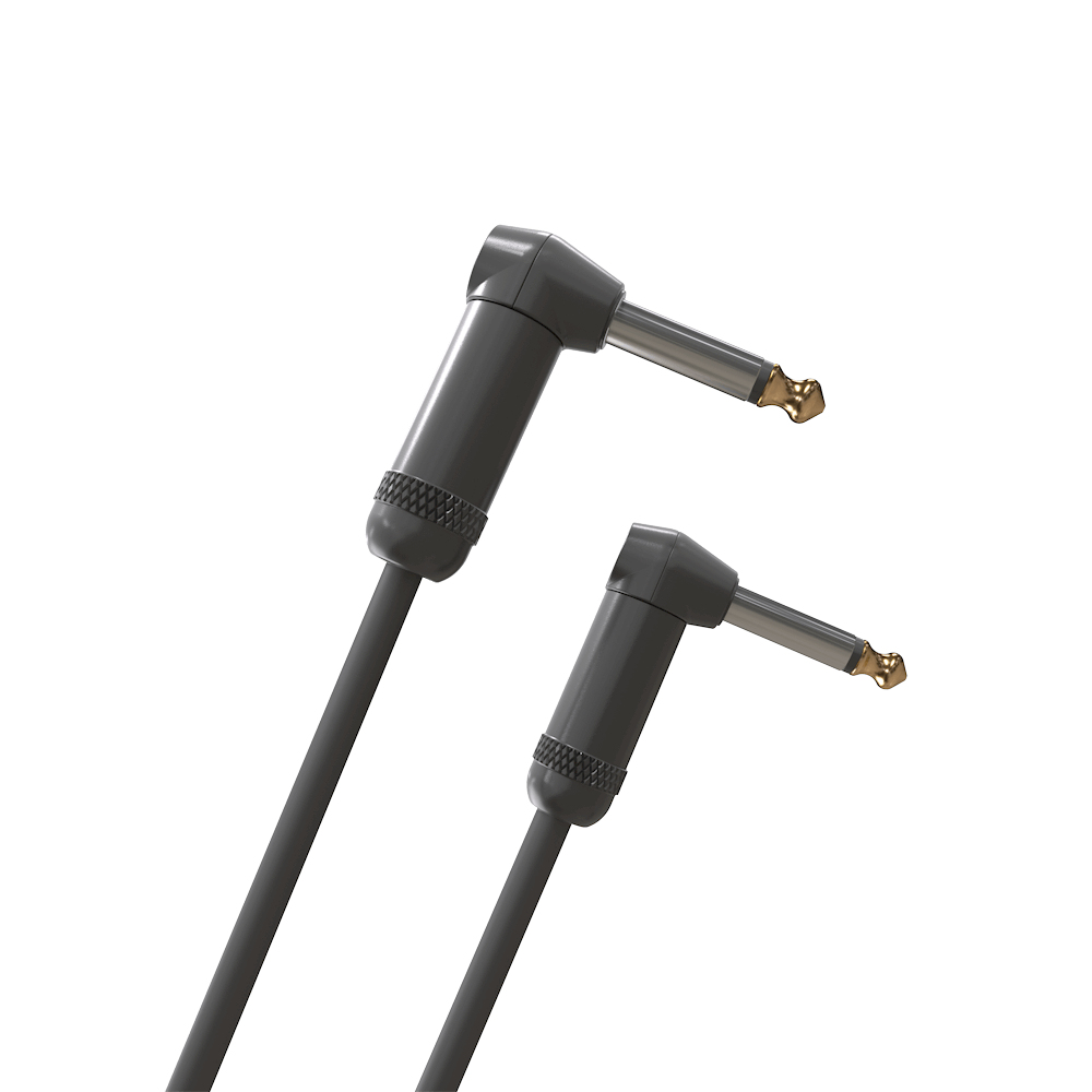 Dwa kątowe, szare kable audio ze srebrnymi i złotymi złączami.