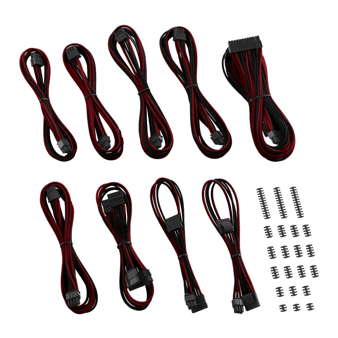 Un assortimento di cavi di alimentazione neri e rossi con connettori e clip neri.