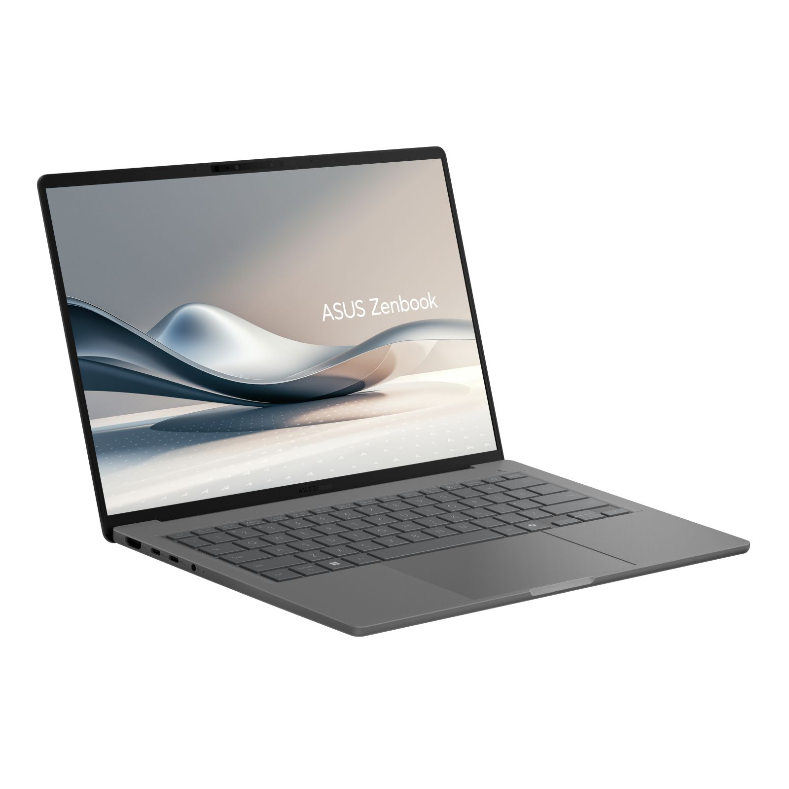 Szary laptop otwarty, wyświetlający logo ASUS Zenbook na ekranie. Laptop jest pod kątem, klawiatura widoczna.