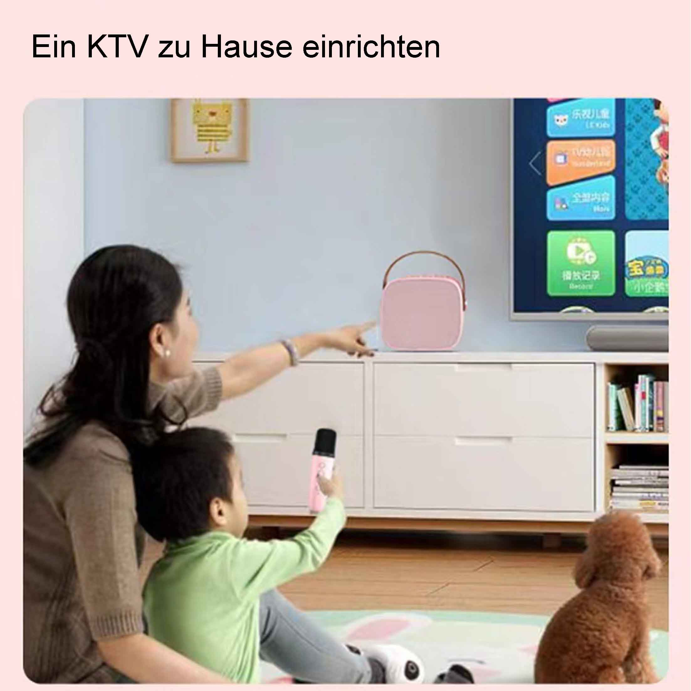 Eine Frau und ein Kind stehen in der Nähe eines Fernsehers. Ein rosa Lautsprecher steht auf einem weißen Schrank. Ein Hund sitzt.