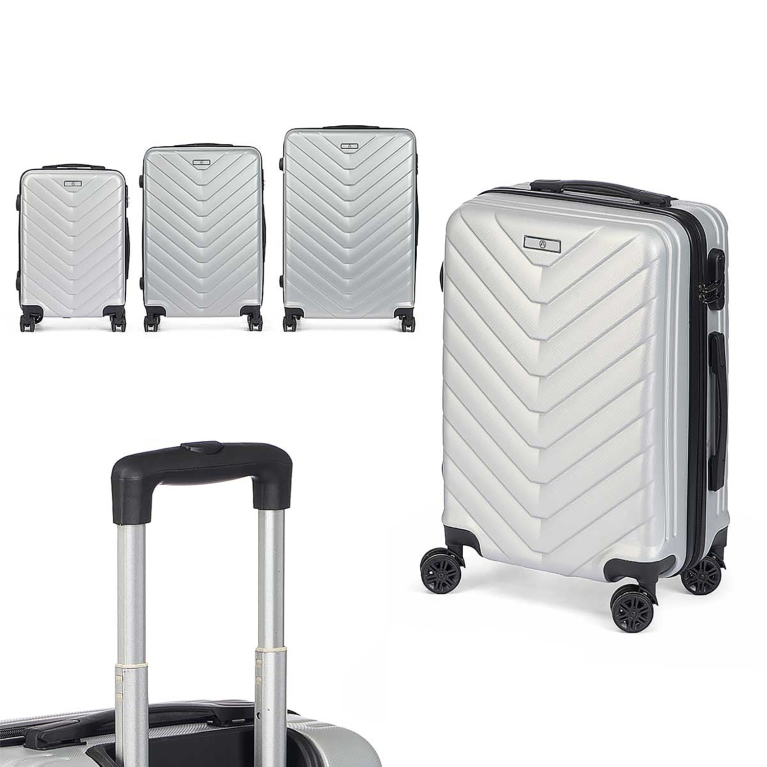 Set silberner Koffer mit schwarzen Griffen. Nahaufnahme des Griffdetails.