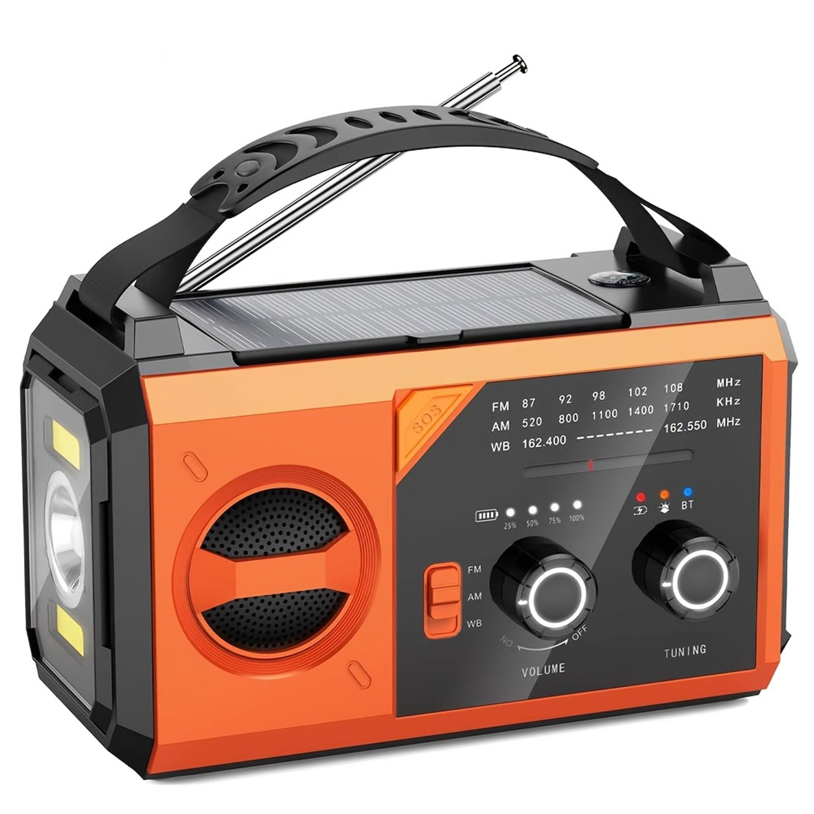 Orange-schwarzes Radio mit Solarpanel. Mit Taschenlampe und Abstimmknöpfen.
