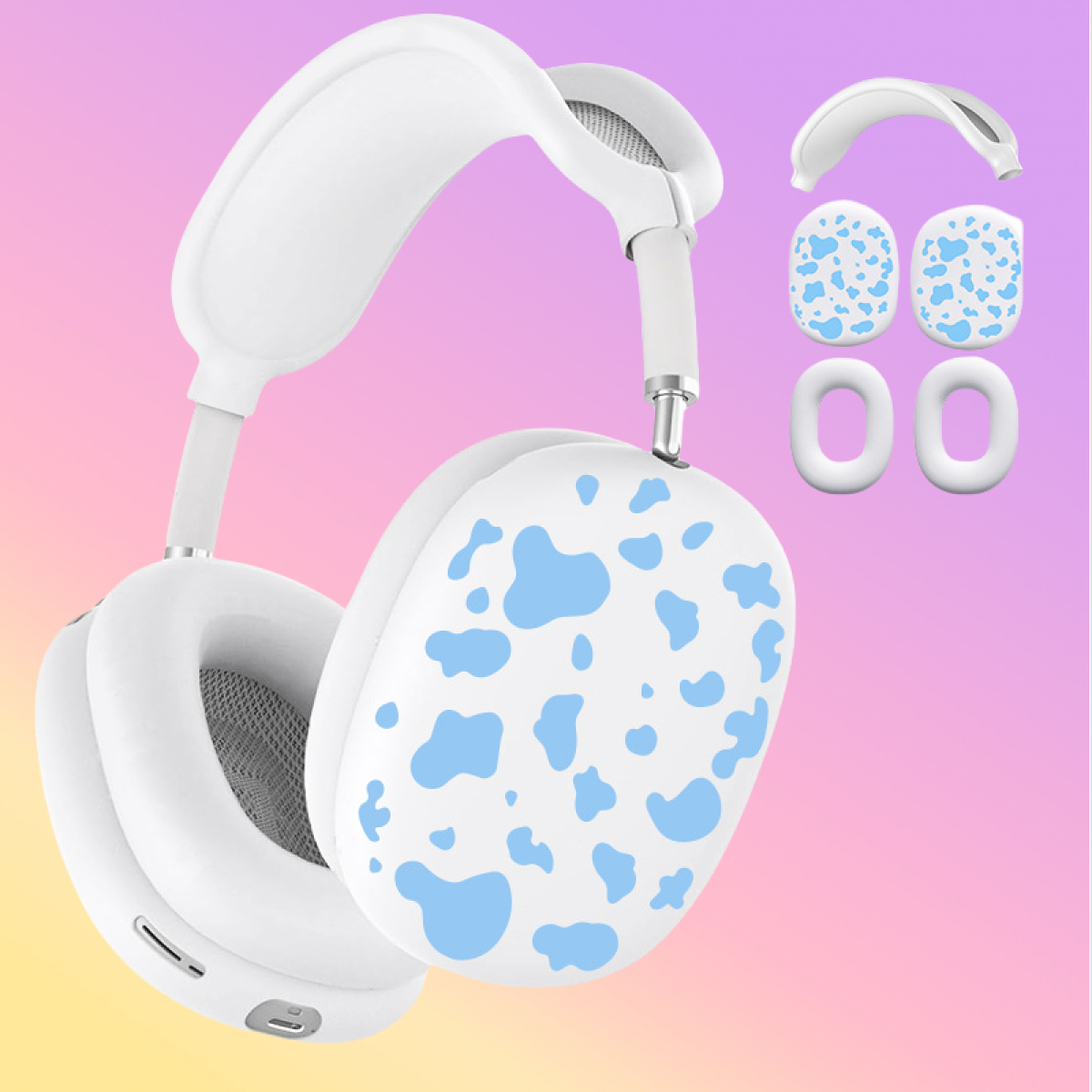 Auriculares blancos con un patrón de vaca azul. También son visibles accesorios blancos y azules adicionales.