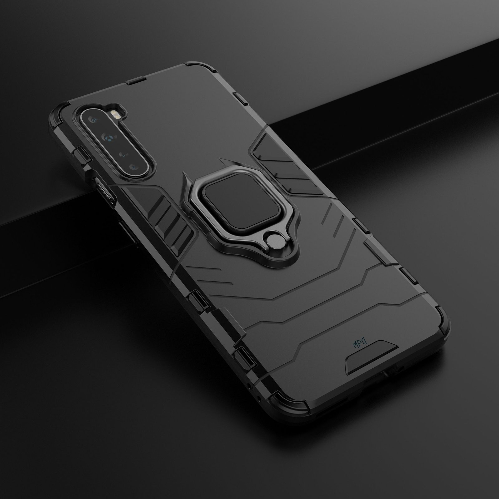 Funda negra para teléfono con soporte de anillo sobre superficie oscura. Muestra el teléfono dentro.