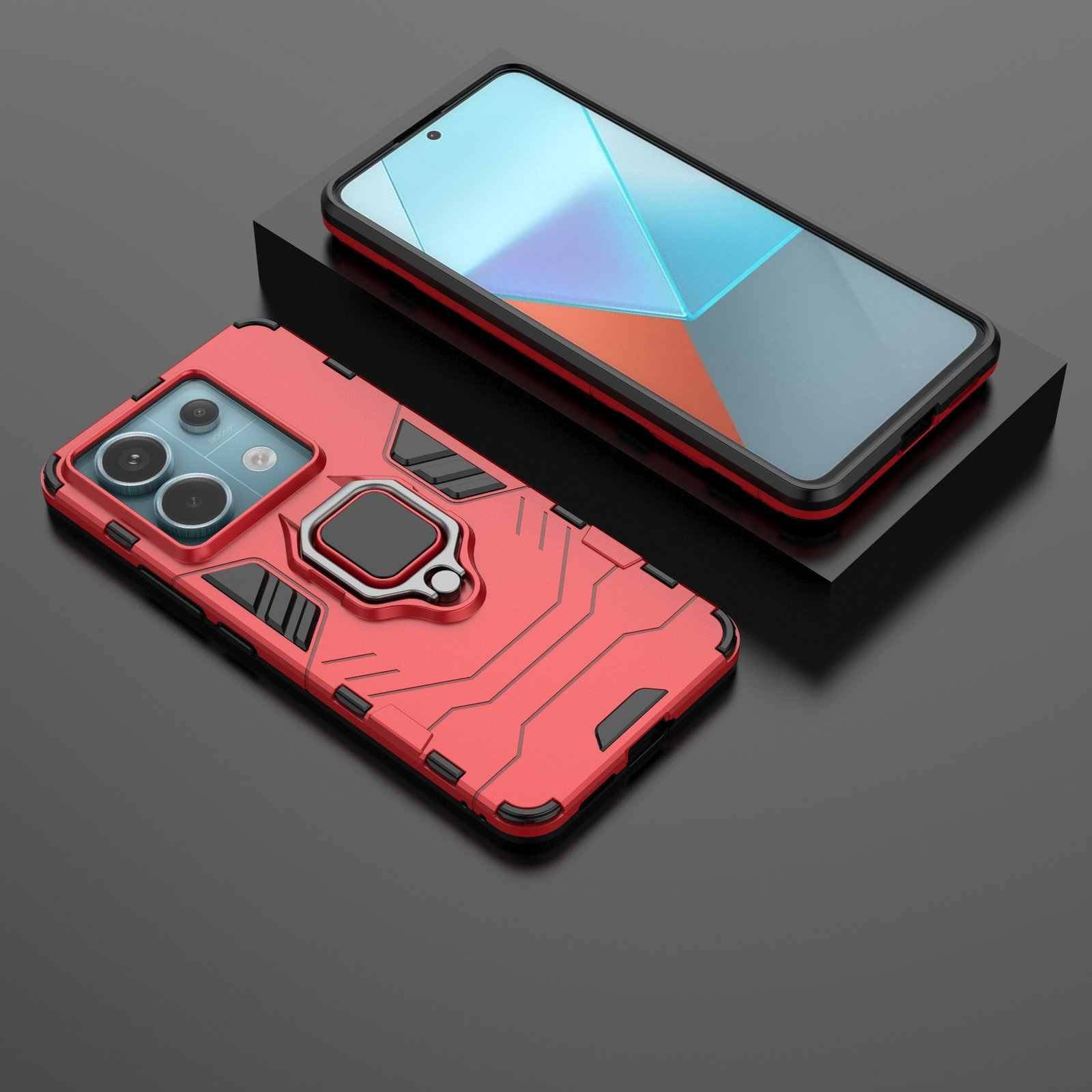 Funda de teléfono roja con soporte de anillo y teléfono. Otro teléfono está en un soporte.