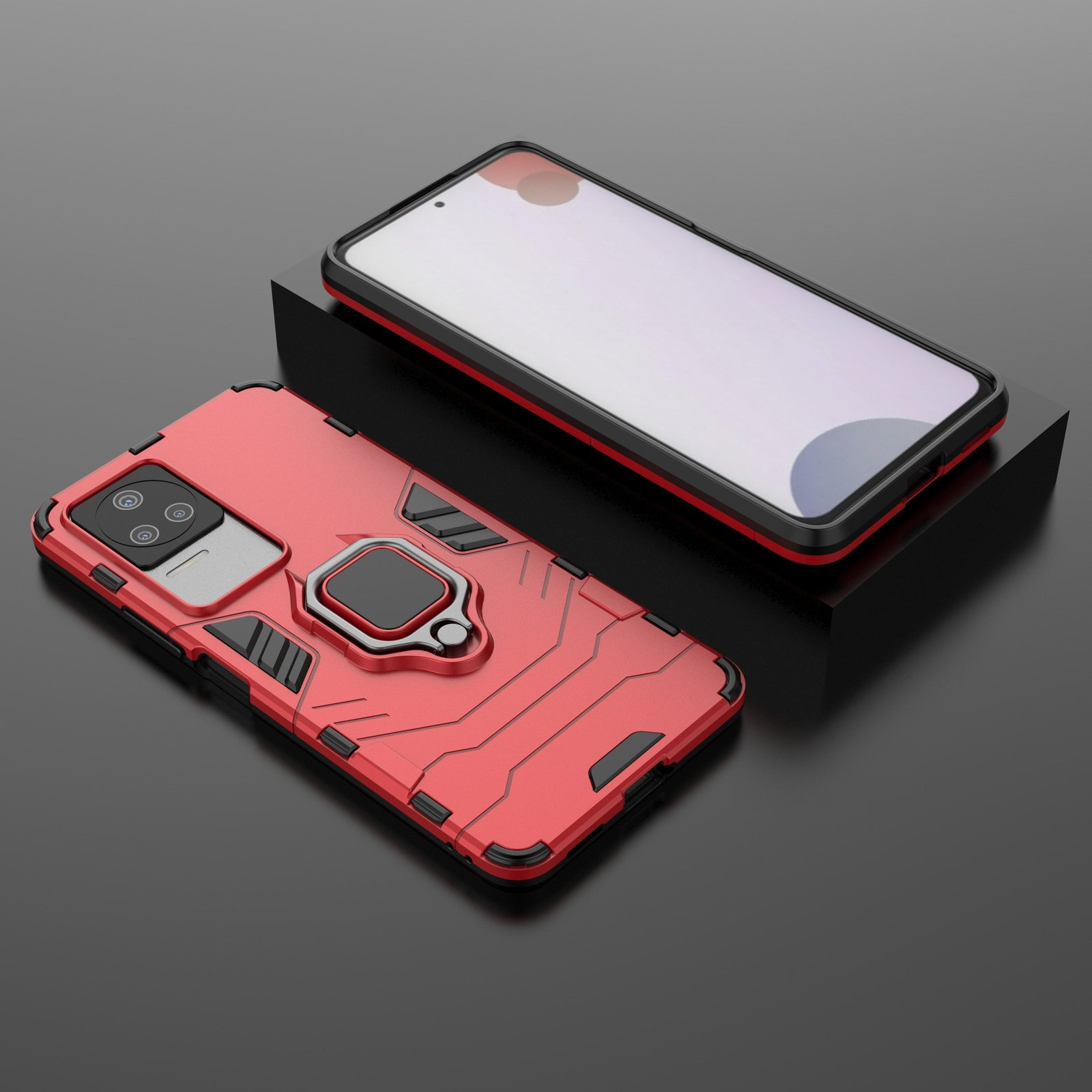 Funda de teléfono roja con teléfono. La funda tiene un soporte de anillo y un recorte para la cámara. El teléfono está en un soporte.