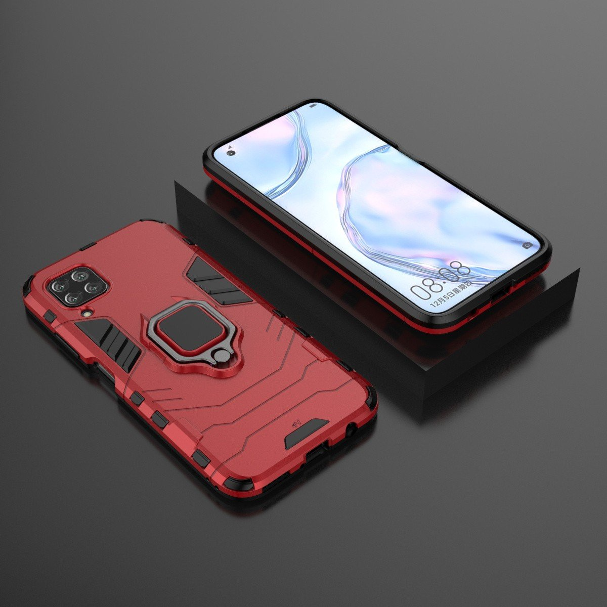 Funda roja con detalles negros y soporte de anillo, con un teléfono al lado.