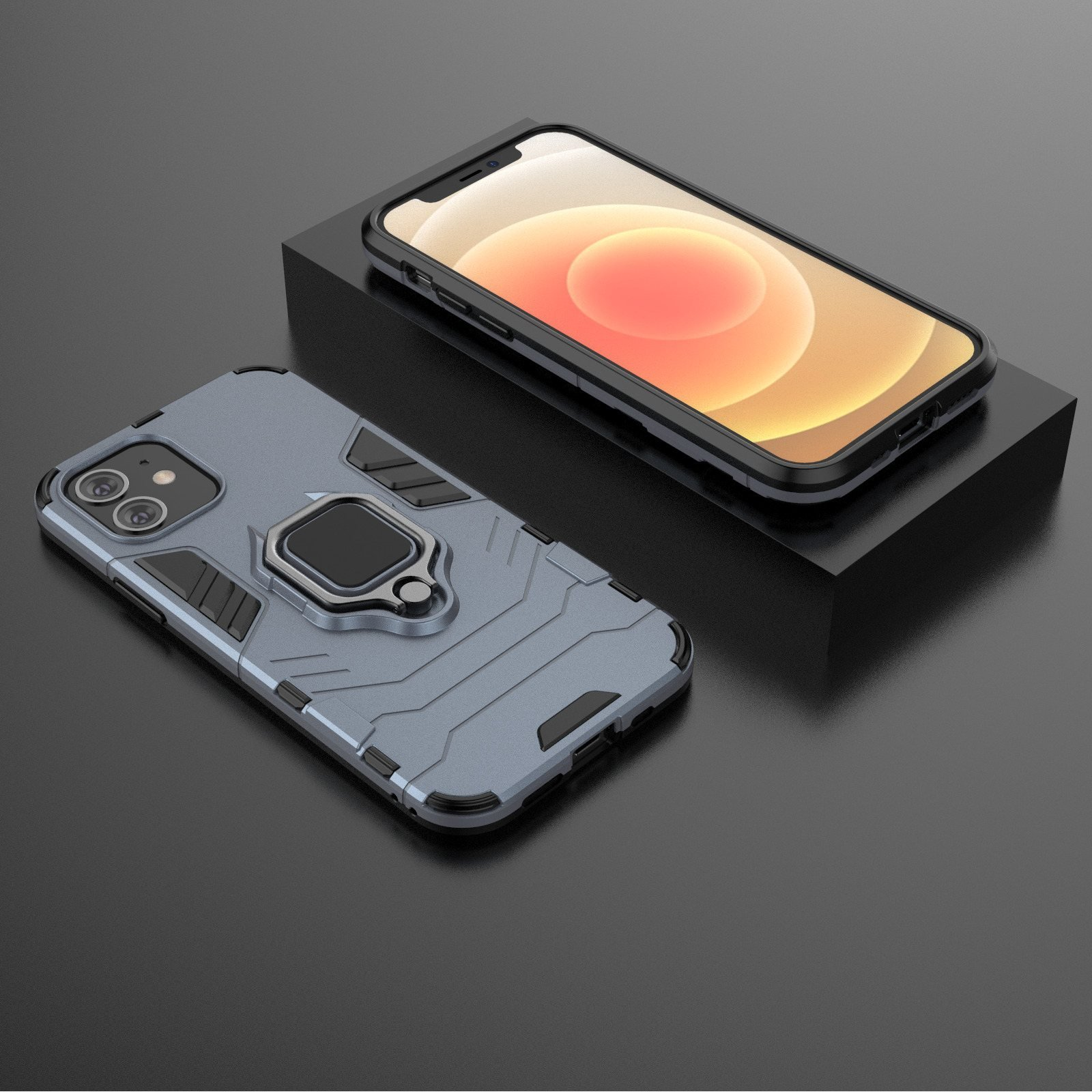 Funda gris con soporte de anillo y teléfono sobre una superficie negra. Vista en ángulo.