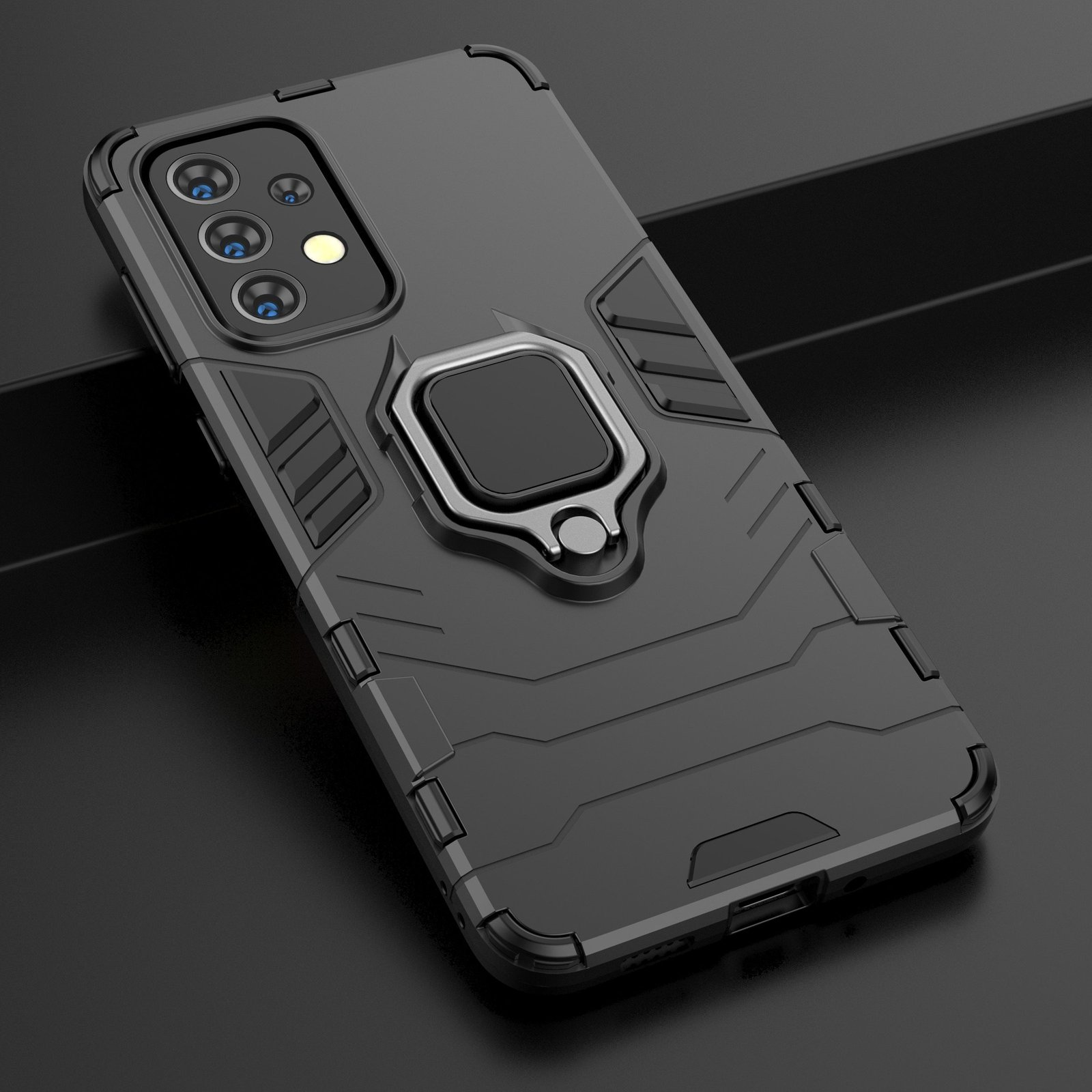 Teléfono en una funda gris oscuro. La funda tiene un soporte de anillo.