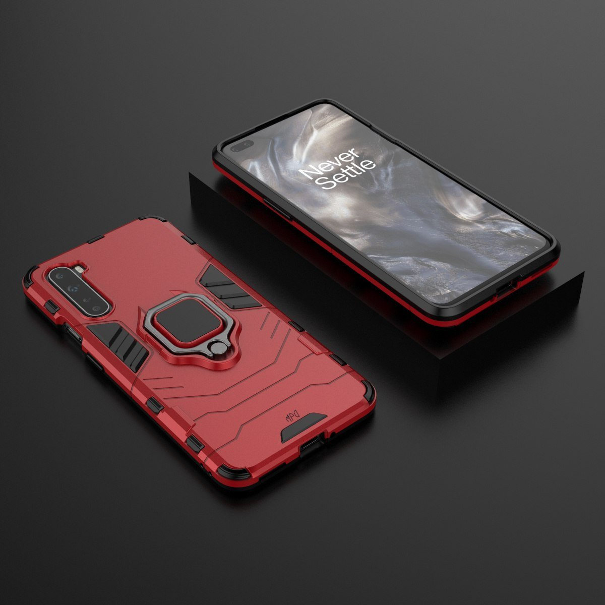 Funda roja para teléfono con soporte de anillo. Teléfono a la derecha. La funda está sobre una superficie negra.