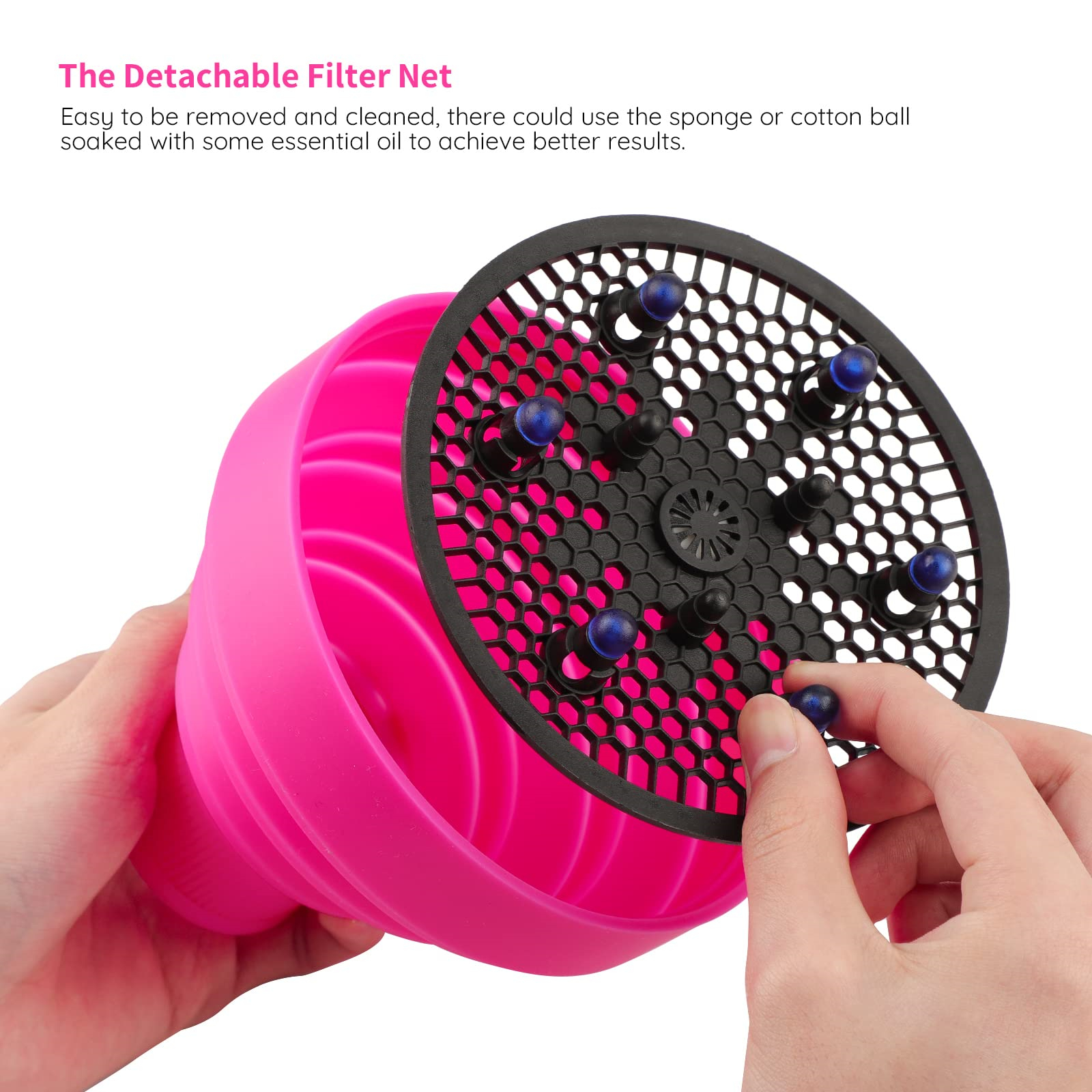 Ein rosa Haartrockner-Diffusor mit Netzoberfläche und blauen Knöpfen, gehalten.
