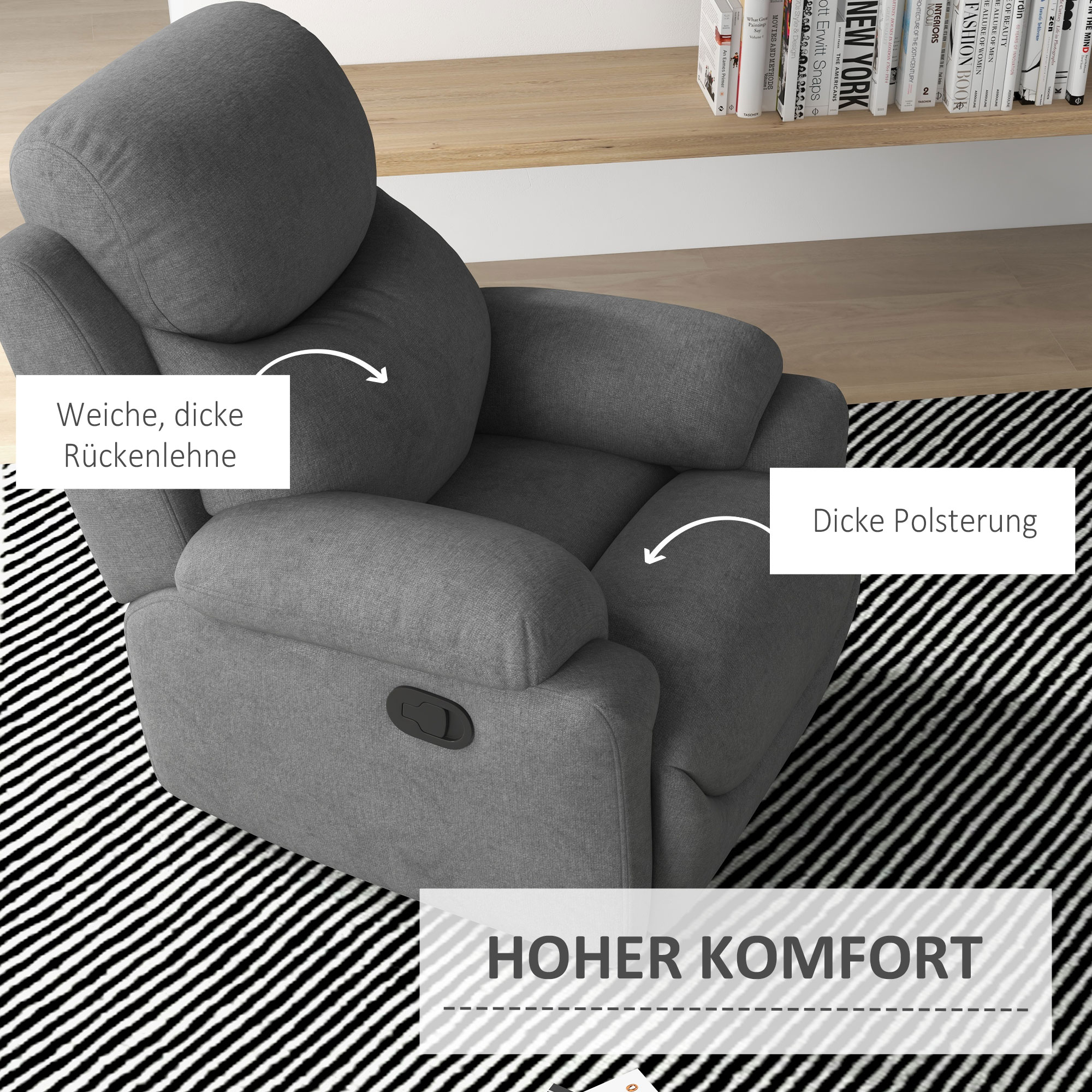 Grauer Relaxsessel. Text hebt weiche Rückenlehne und dicke Polsterung hervor. Schwarz-weißer Teppich darunter.