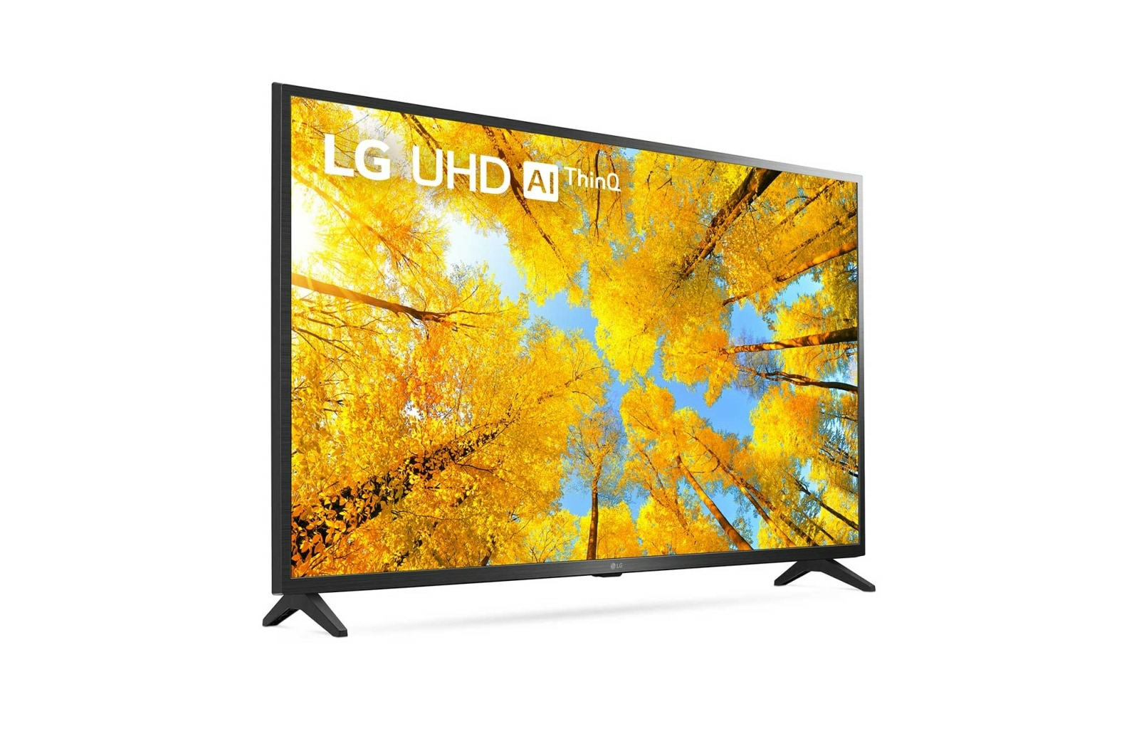 Un televisore LG UHD mostra una foresta di alberi giallo dorato in autunno.