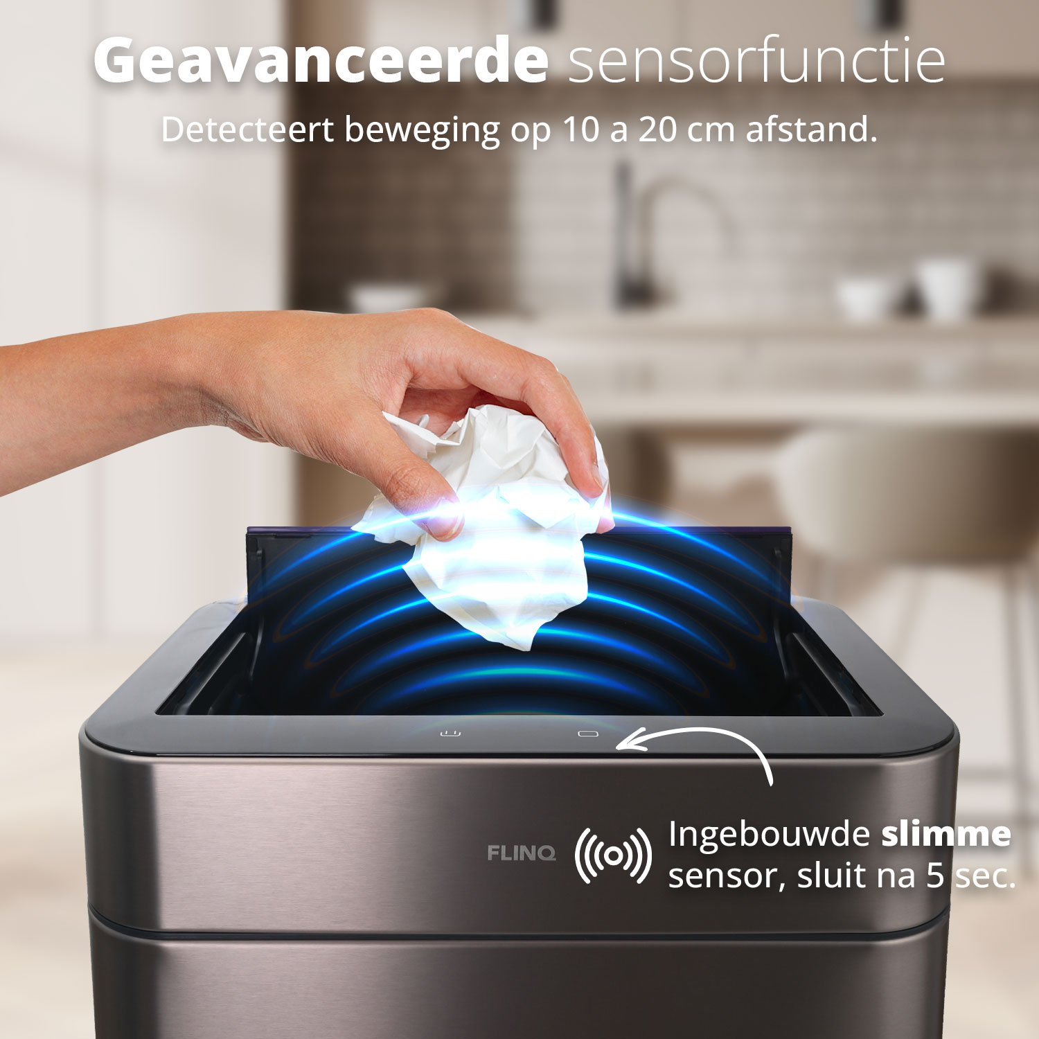 A person throwing a tissue into a smart sensor trash can.