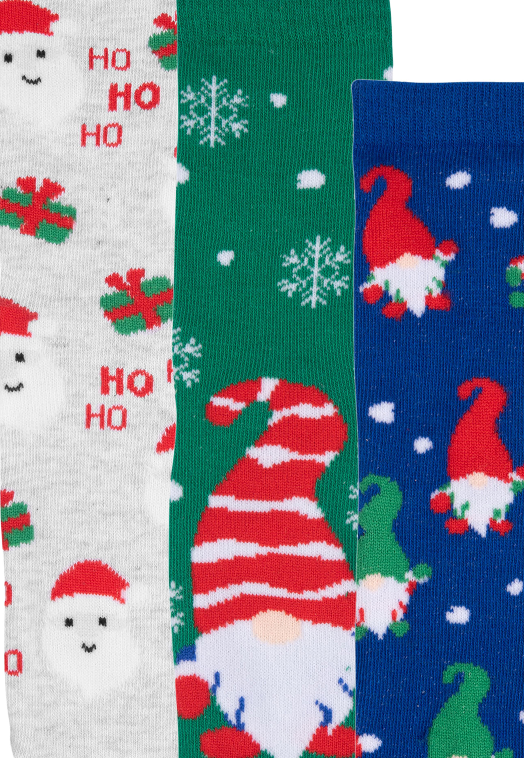 Weihnachtssocken mit verschiedenen Mustern. Santa, Zwerg und Schneeflocken-Designs. Bunt.