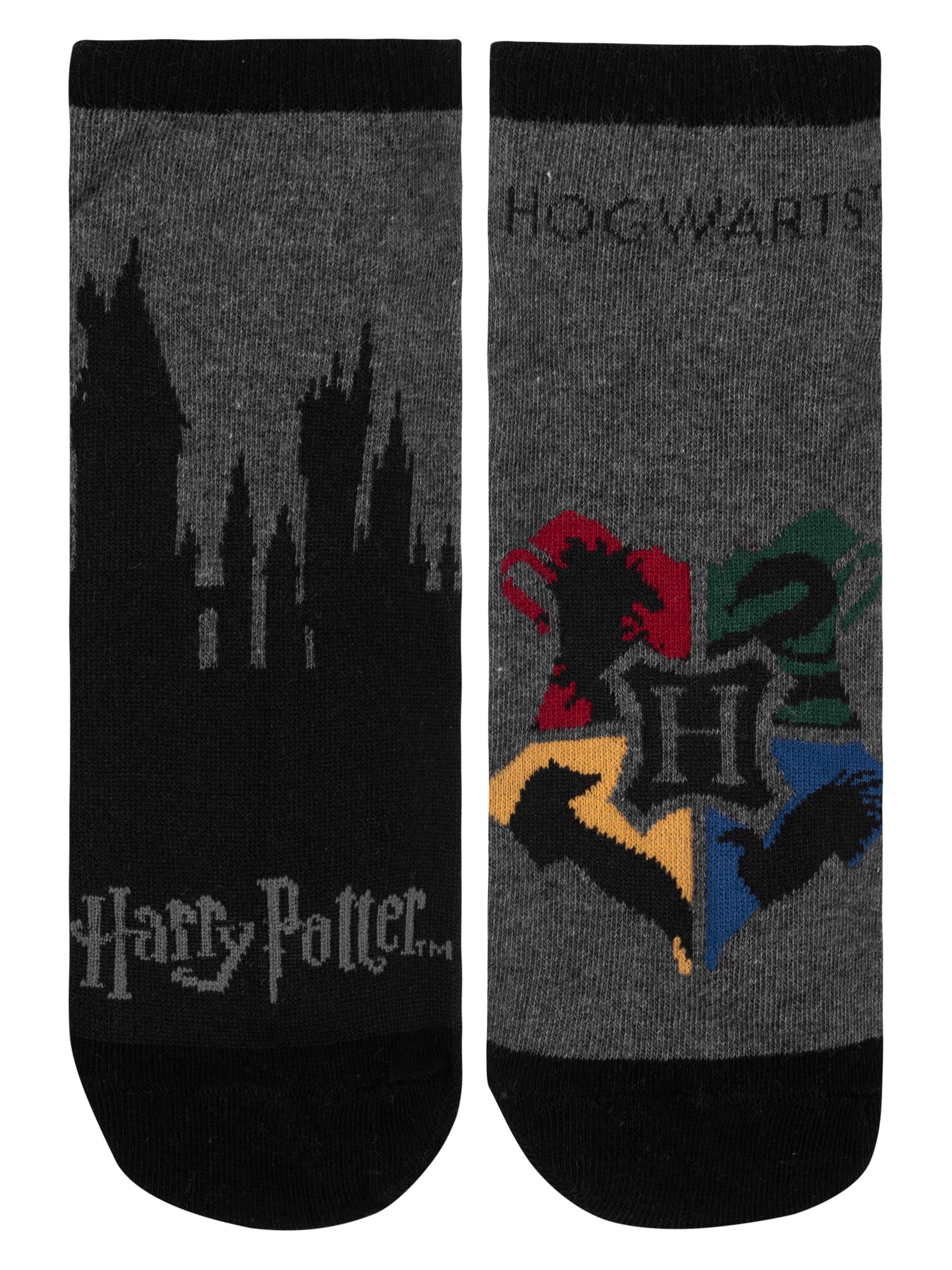 Paar graue Harry Potter Socken mit Hogwarts-Wappen und Silhouettenburg, auf weißem Hintergrund.