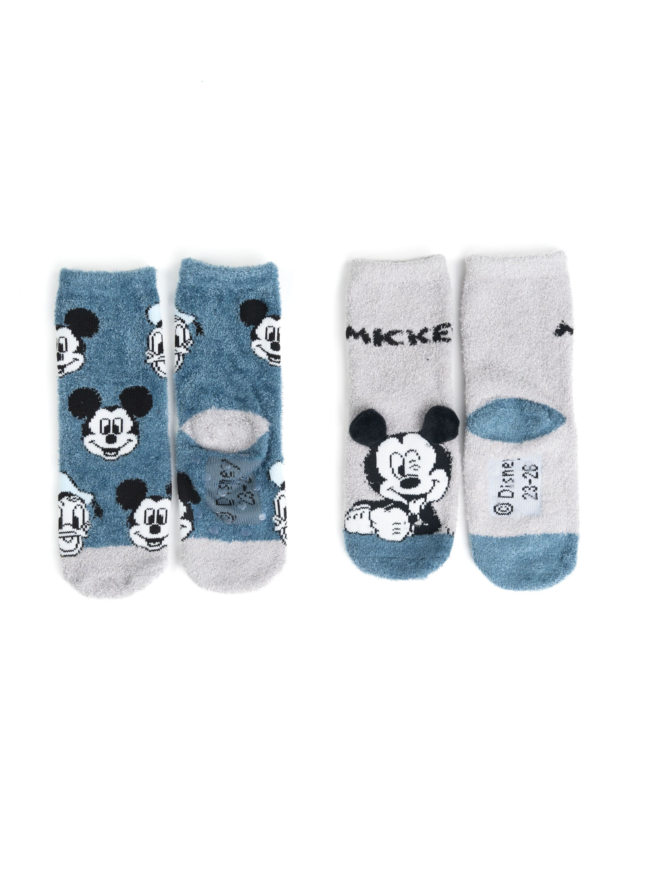 Zwei Paar Socken mit Mickey-Mouse-Motiven. Eines hat Mickey, das andere Donald Duck.