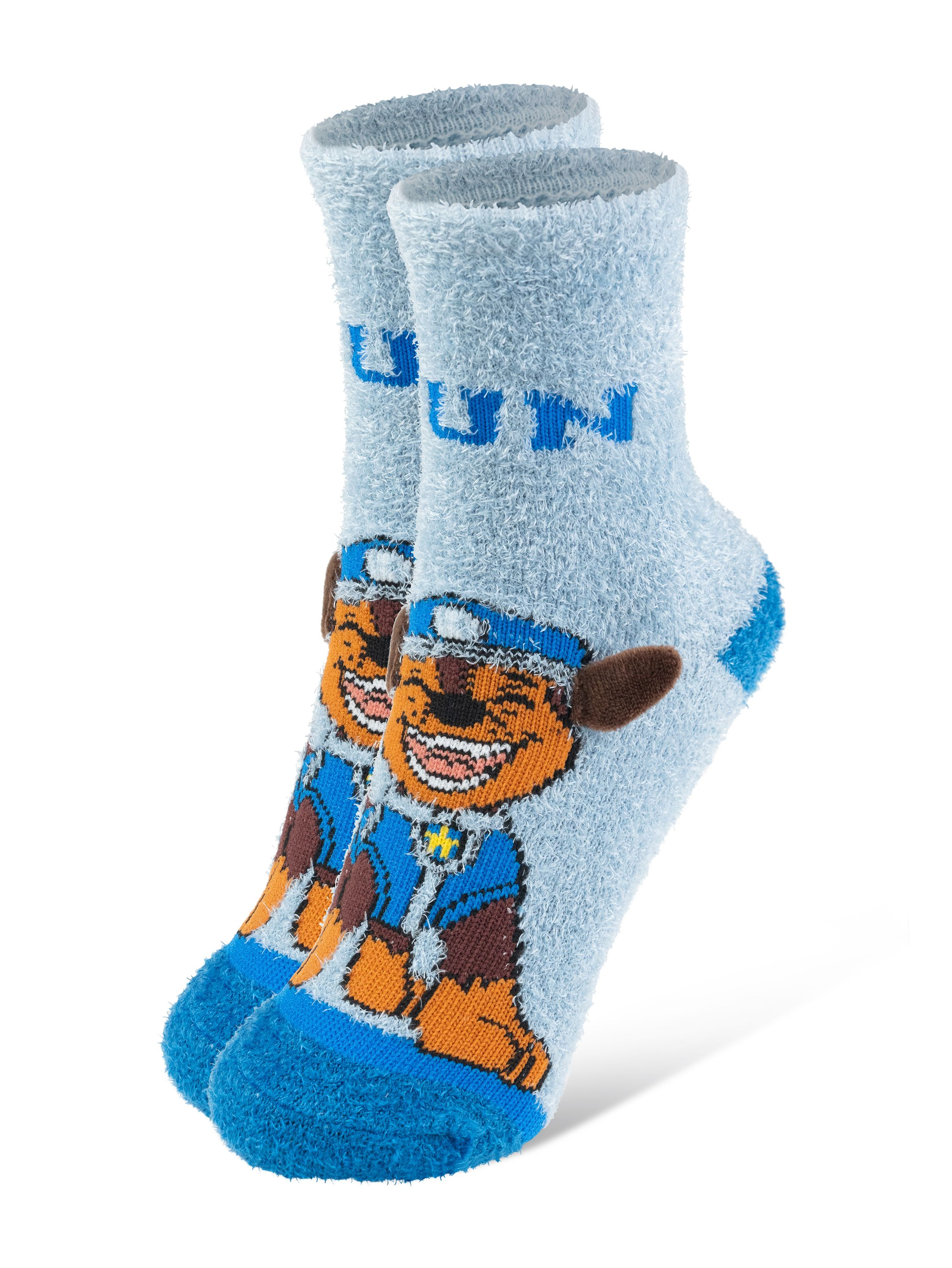 Paar blaue, flauschige Socken mit Chase von Paw Patrol darauf.