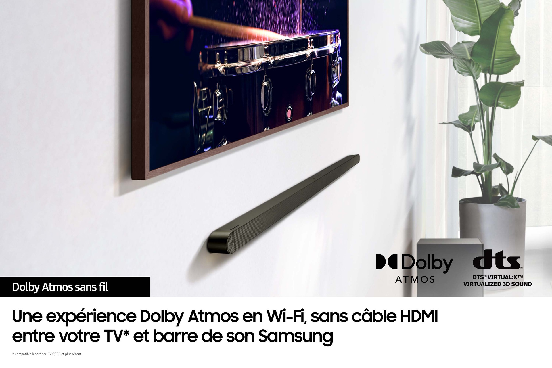 Soundbar zamontowany pod telewizorem. Widoczne logo Dolby Atmos i DTS.