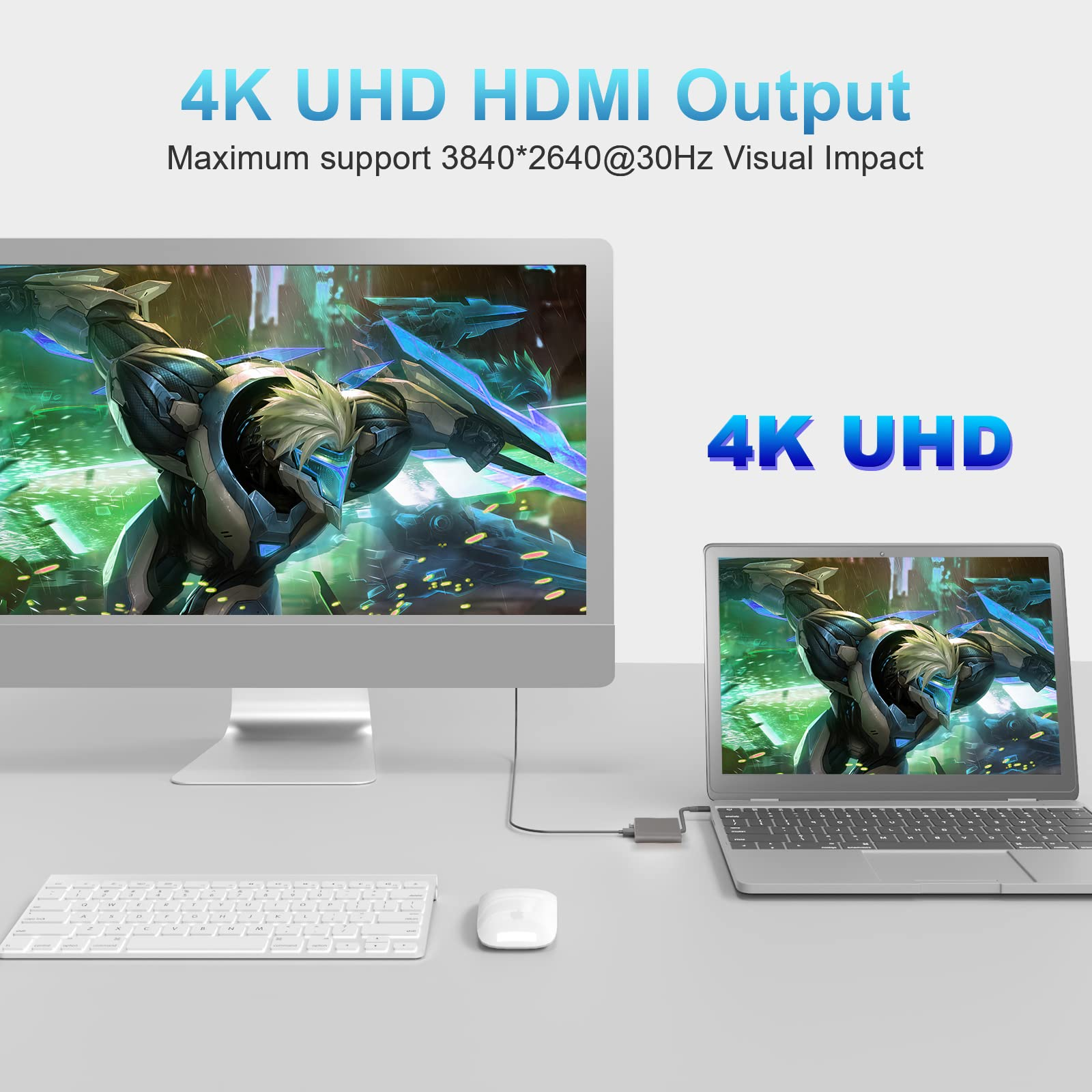 Ein Computerbildschirm und ein Laptop, die über einen 3-in-1-Hub verbunden sind, zeigen eine Spielszene.