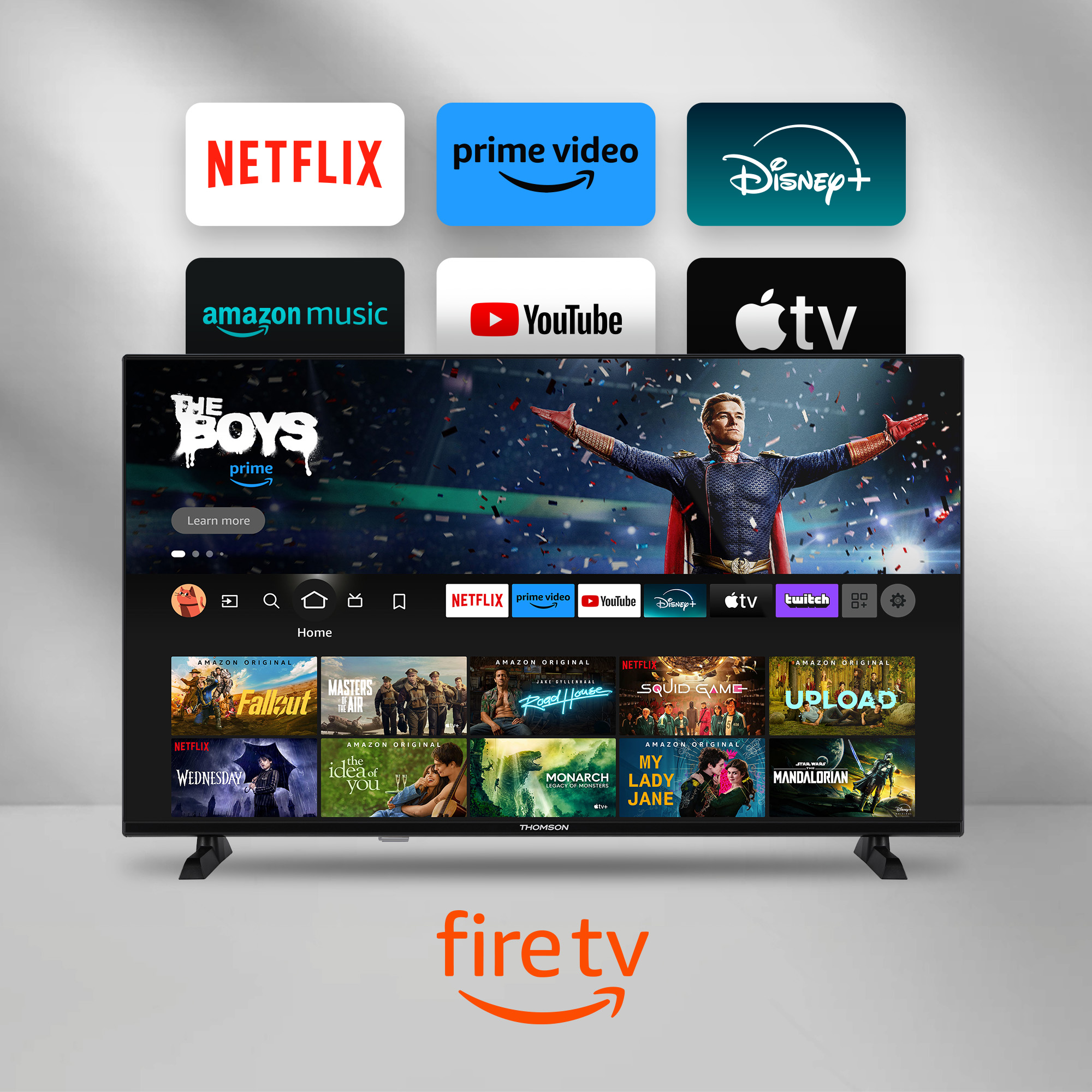 Un televisore Thomson che mostra l'interfaccia Fire TV con varie icone di app di streaming.