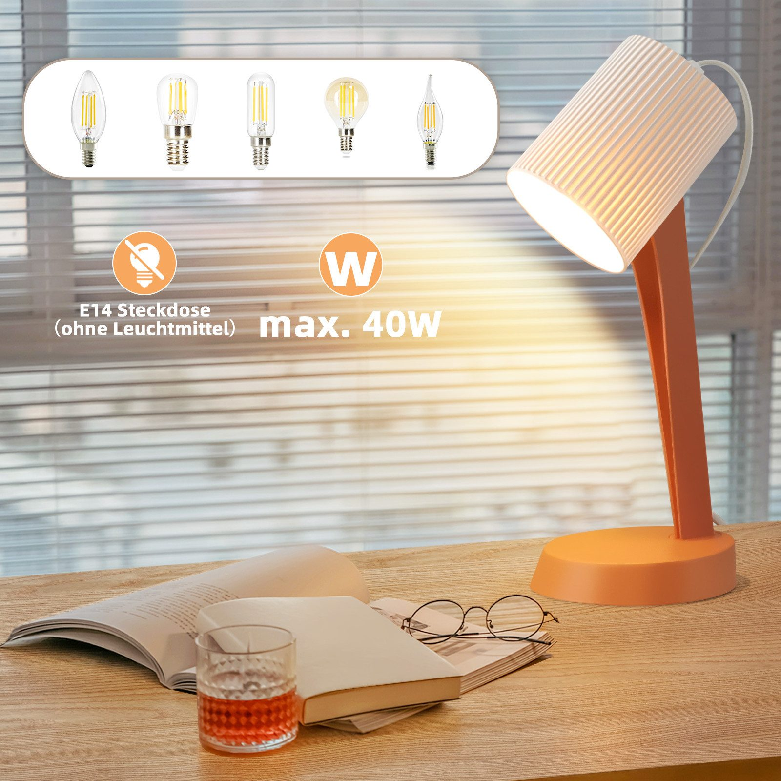 Pomarańczowa lampa z różnymi żarówkami na drewnianym stole.