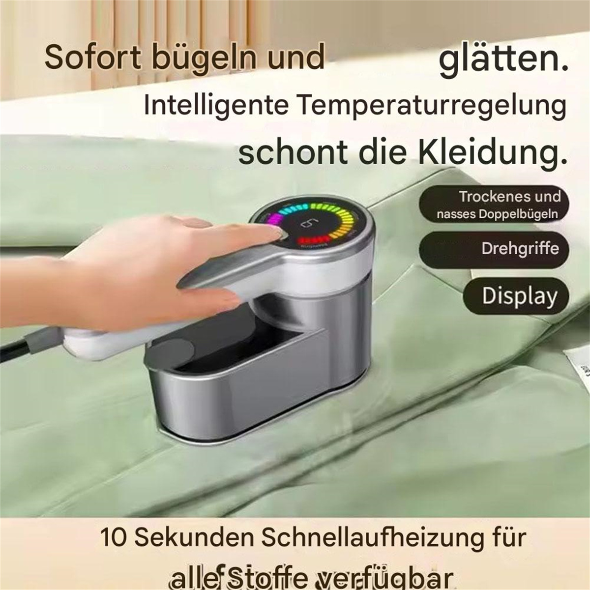 Handdampfgarer mit Display. Es ist auf einem grünen Kleidungsstück.