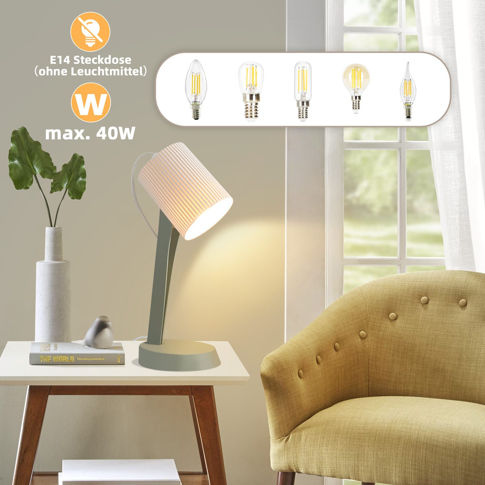 Lampa biurkowa z białym kloszem i jasnozieloną podstawą, wazon i ozdoba w kształcie ptaka.