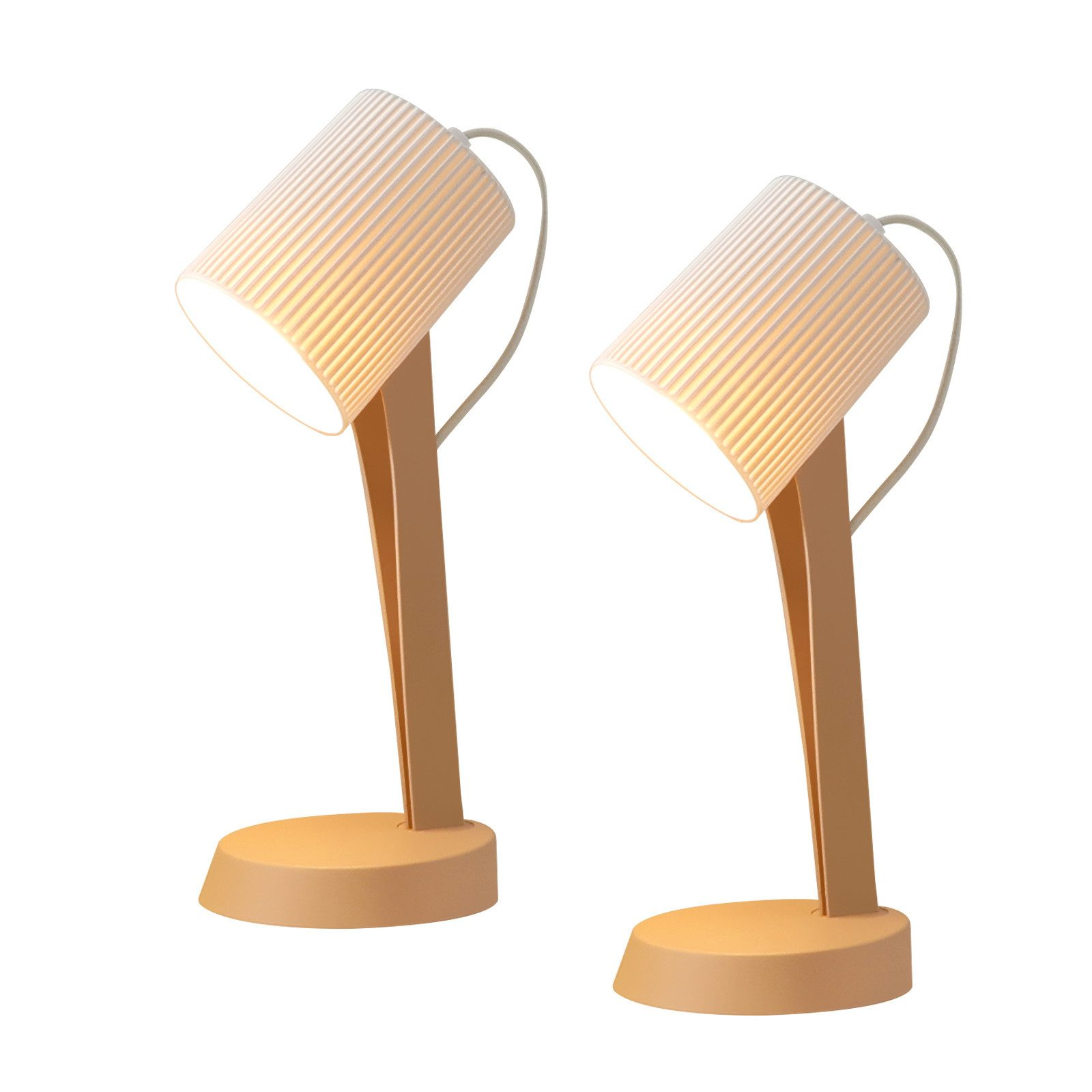 Dwie lampy stołowe z ukośnymi głowicami, cylindrycznymi kloszami i beżowymi podstawami, na białym tle.