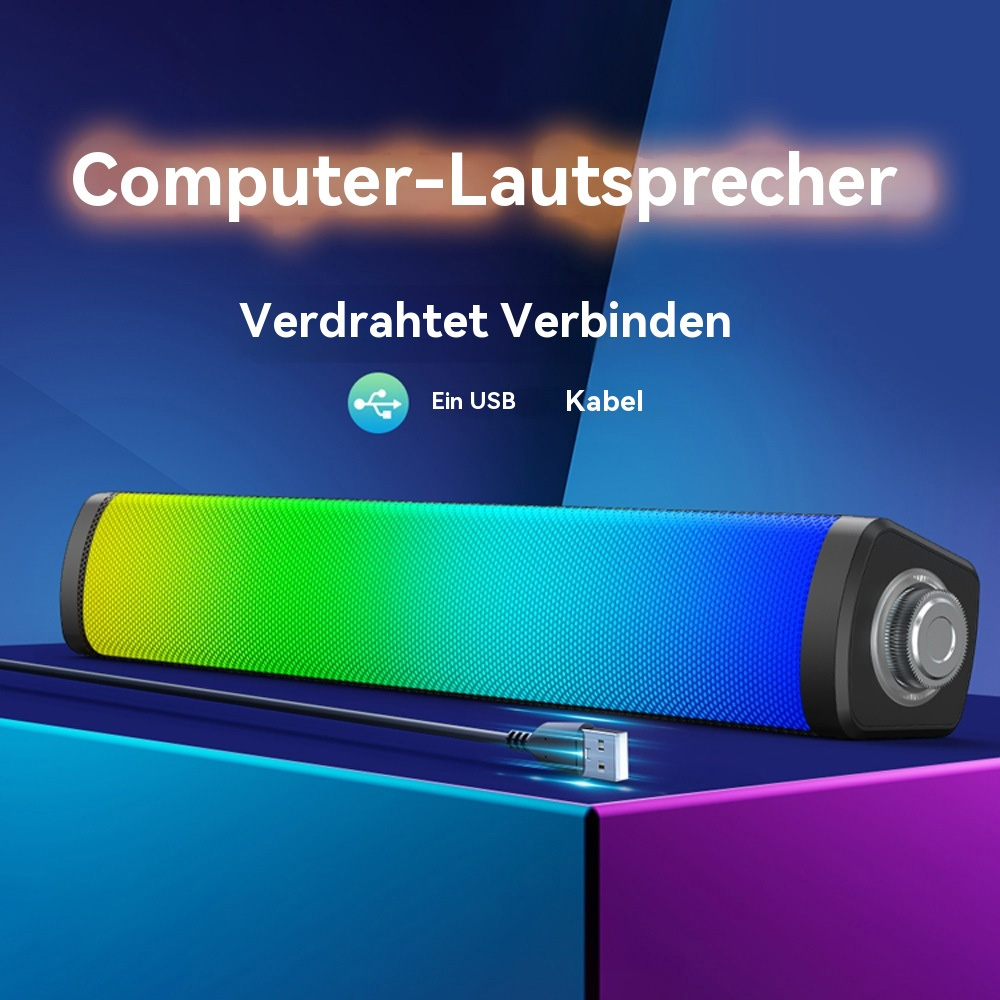 Schwarzer Lautsprecher mit farbenfrohem Gradientenvorderteil. Er hat ein USB-Kabel und einen Lautstärkeregler.