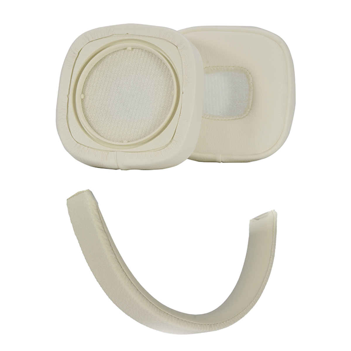 Cuscinetti auricolari e parte dell'archetto beige per cuffie, disposti su una superficie bianca.