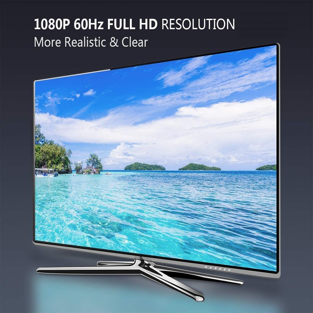 Ekran telewizora przedstawiający scenę na plaży z błękitnym niebem i wodą. Tekst powyżej.