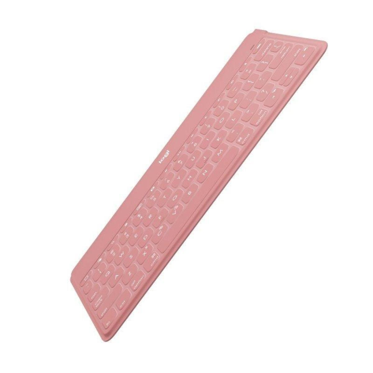 Różowa klawiatura Logitech pokazana pod kątem. Ma klawisze i logo Logitech.