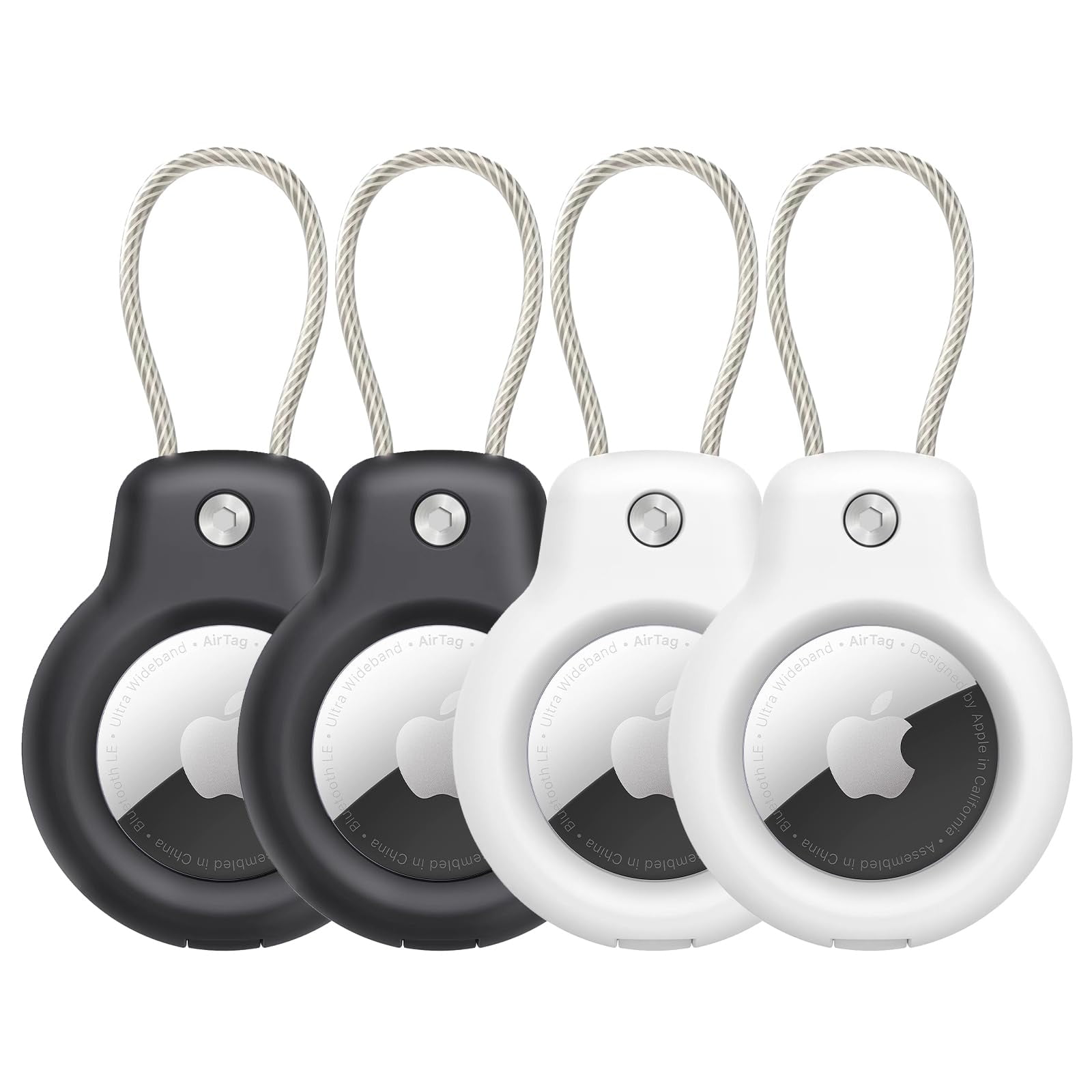 Vier Apple AirTag-Halter. Schwarz und weiß, mit silbernen Ringen. Weißer Hintergrund.