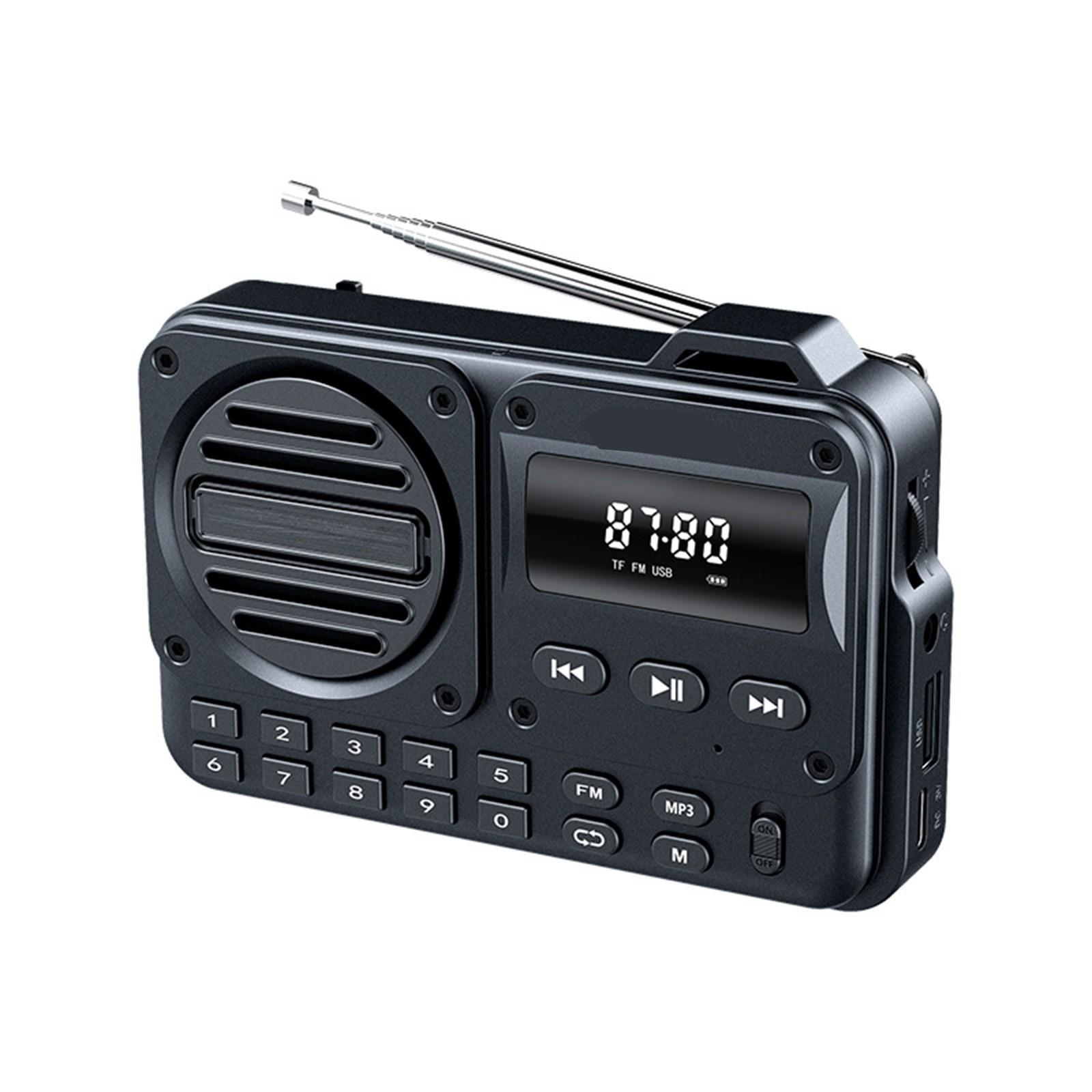Schwarzes Radio mit Bildschirm, Knöpfen und Antenne. Es zeigt 87.00 auf dem Bildschirm.
