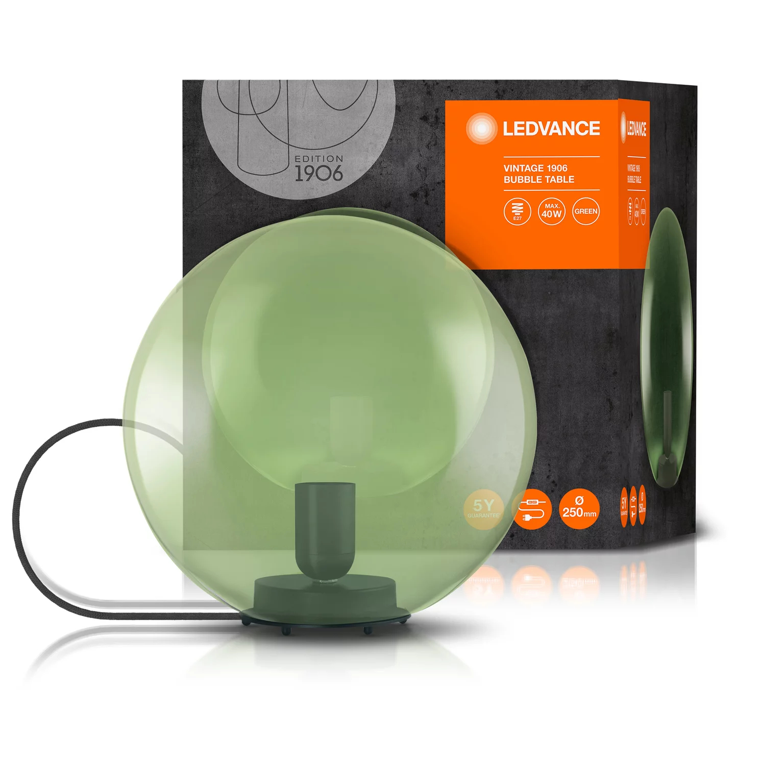 Zielona szklana lampa bąbelkowa z czarną podstawą. Pudełko z zielonym obrazem lampy. Czarny kabel, 5 lat gwarancji.