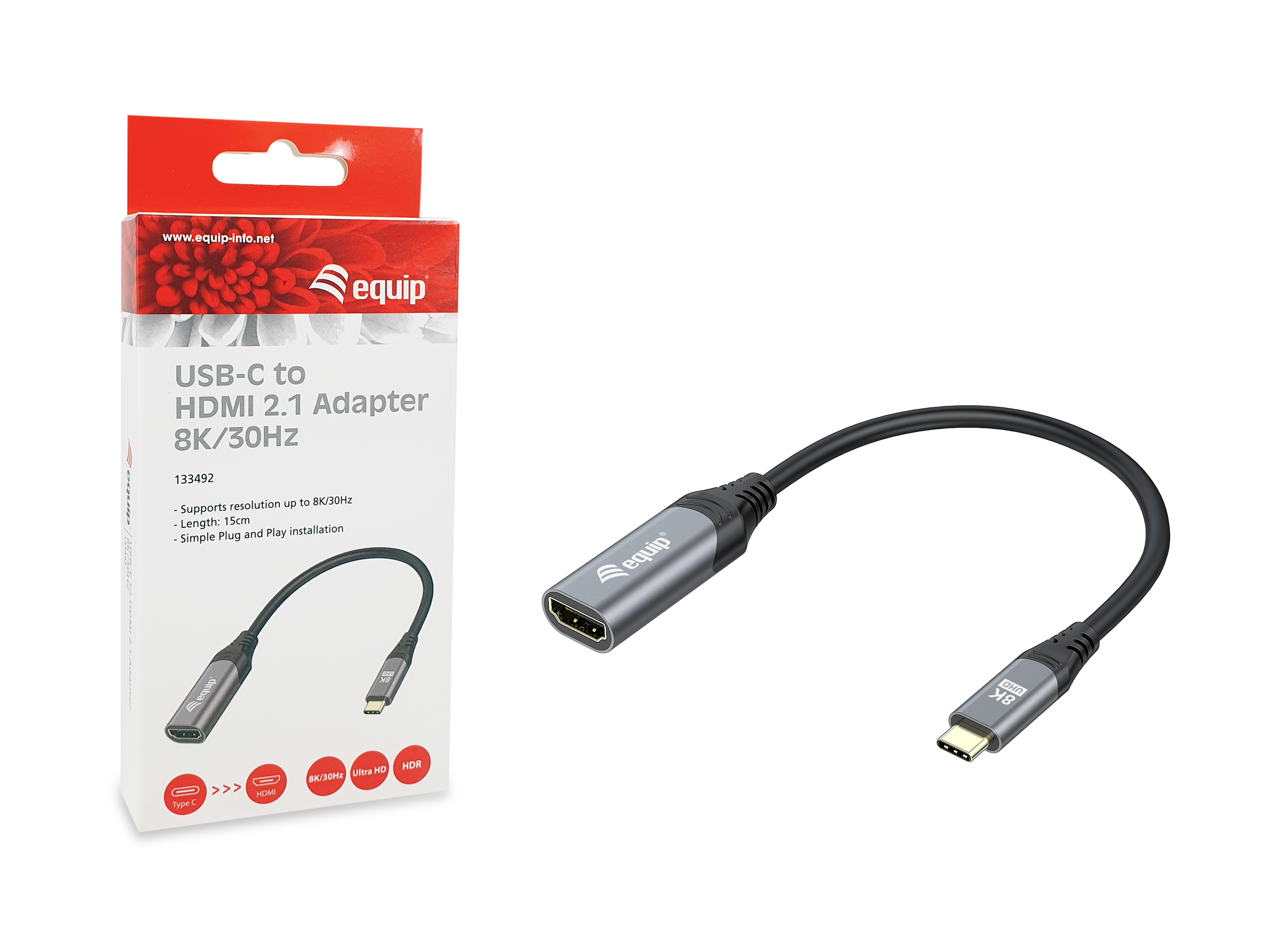 Adapter USB-C do HDMI z pudełkiem. Adapter jest czarny. Pudełko jest biało-czerwone.