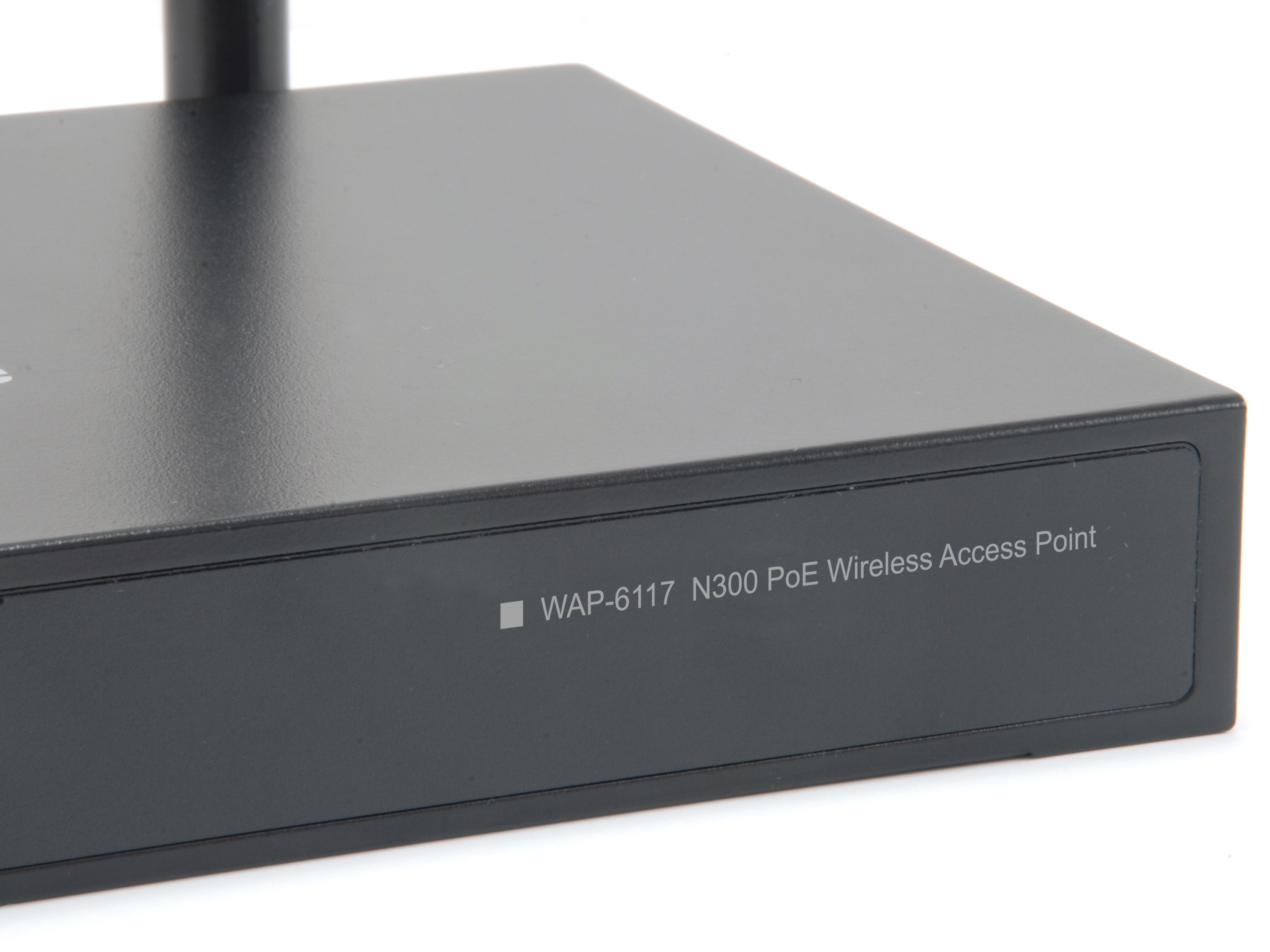 Black access point device with antennas. It has the text: WAP-6117 N300 PoE.